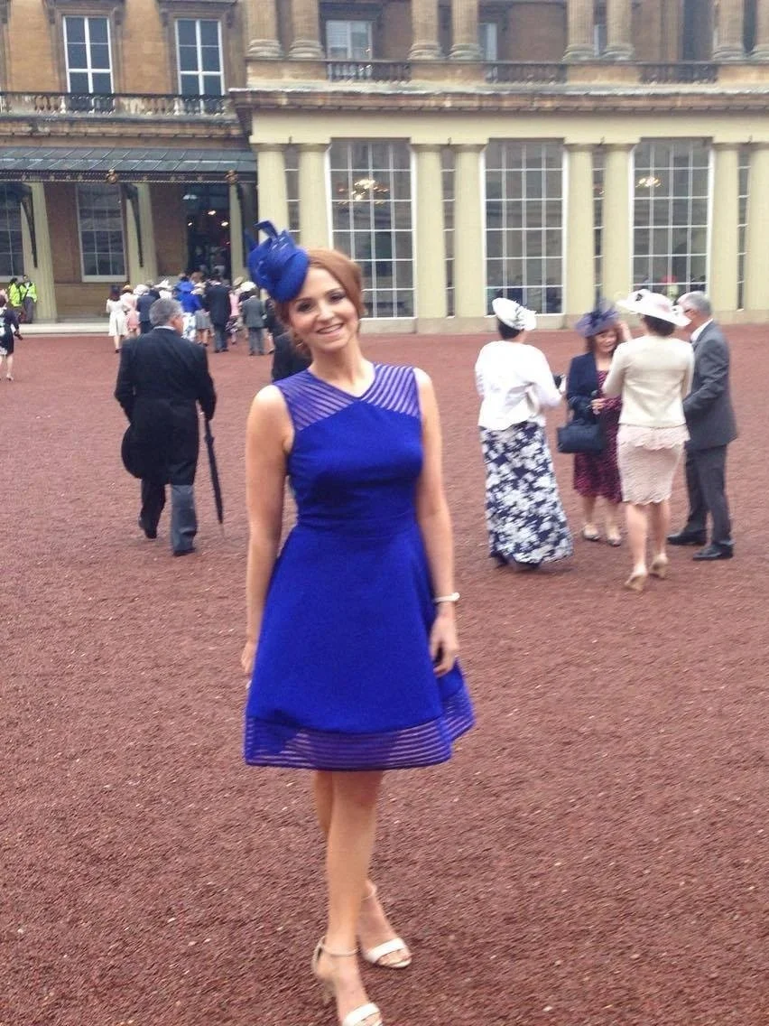 Royal Blue - Buckingham Palace guest wearing a John Paul Millinery headpiece.