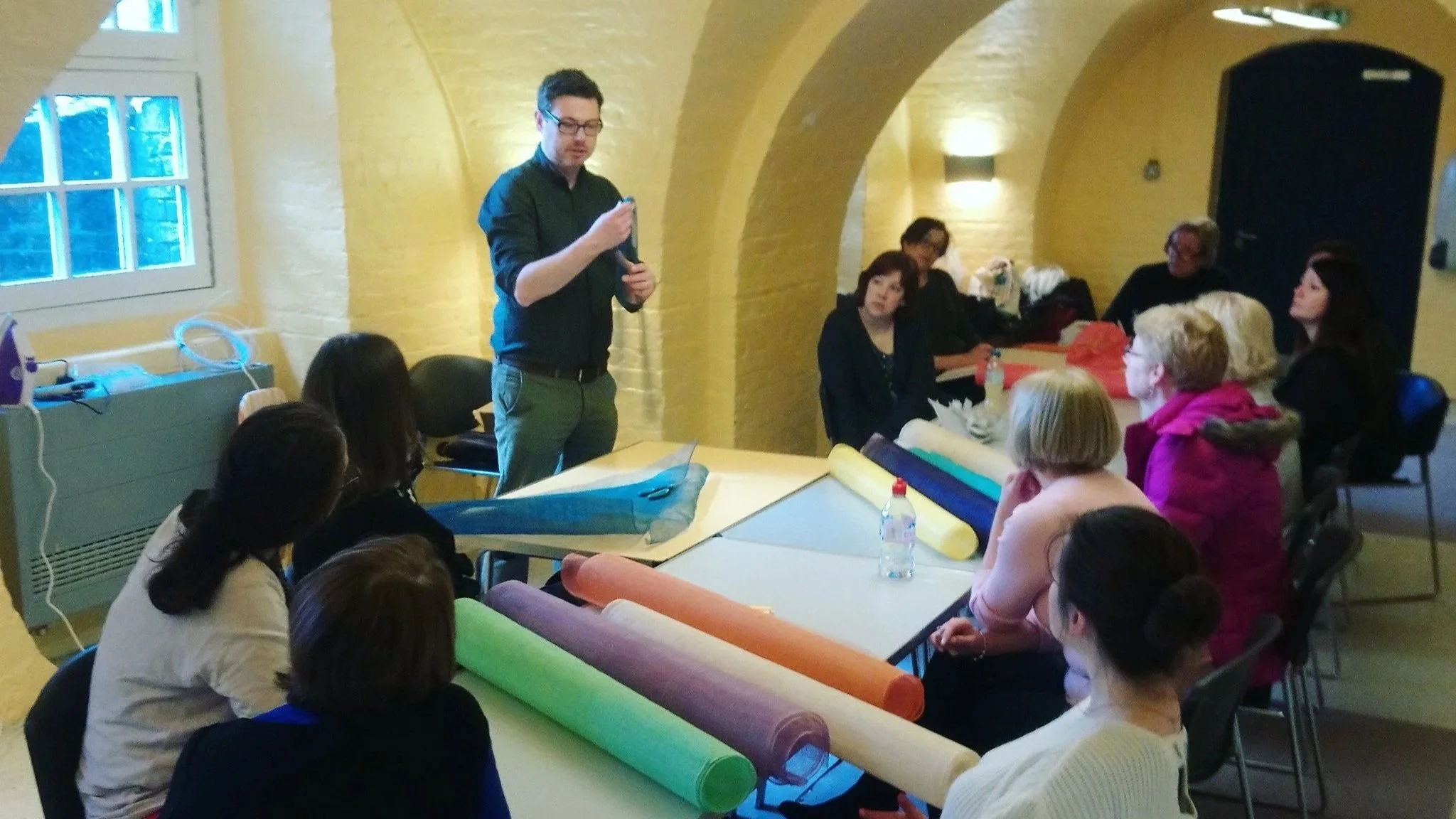 John Paul Deehan of John Paul Millinery talking to students at his free-form sinamay hat workshop during London Hat Week..