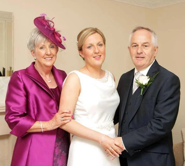 Mother of the Bride wearing John Paul Millinery 