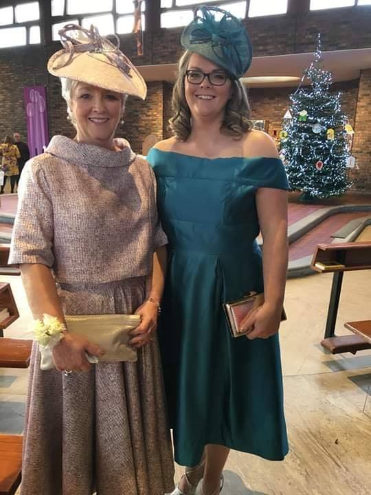 Mother of the Bride and Sister of the Bride both wearing John Paul Millinery