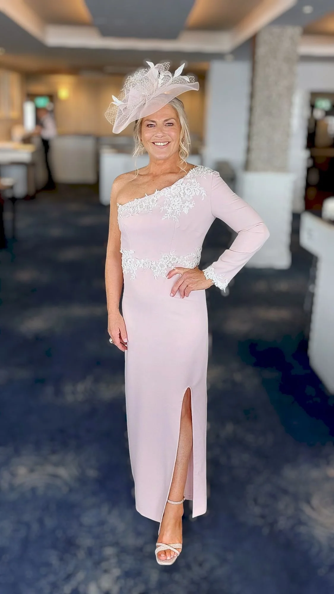Mother of the Bride in pale pink John Paul Millinery headpiece at the Redcastle Hotel in Donegal