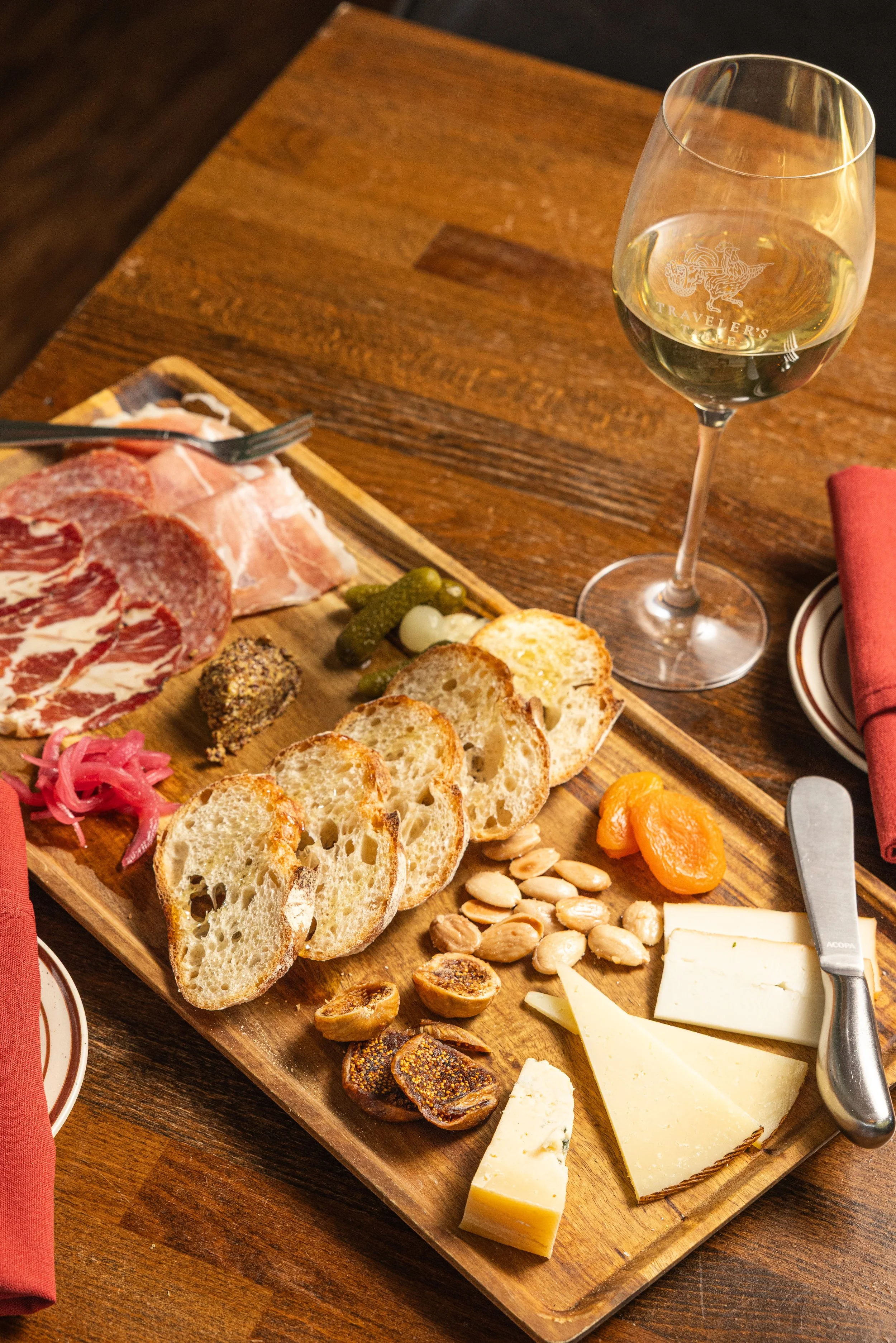 TRAVELER’S BOARD
Three cheeses, three cured meats and seasonal accompaniments for sharing · Around the World
