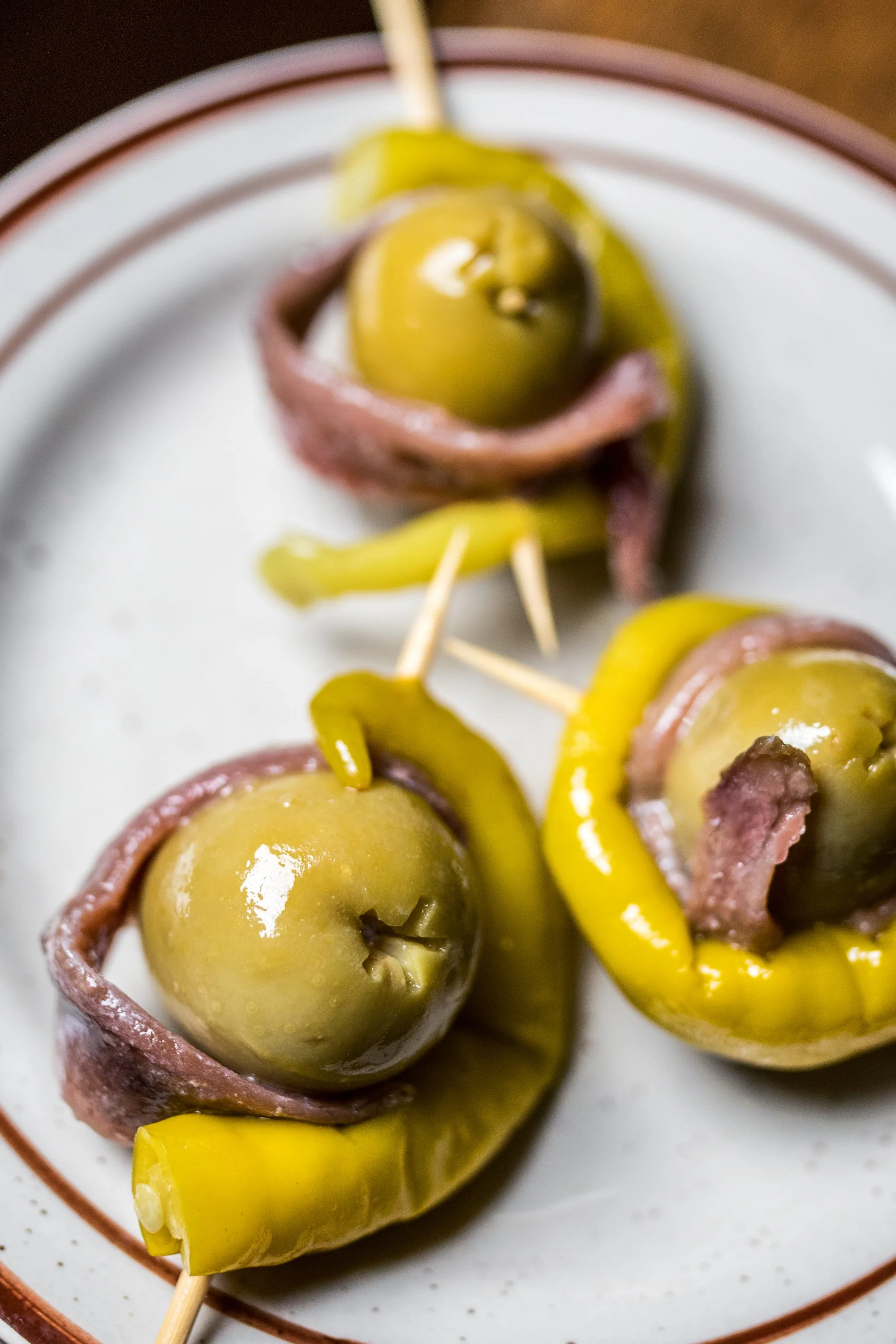 GILDA
Three anchovy, olive and piparra pepper skewers (gf) · Spain