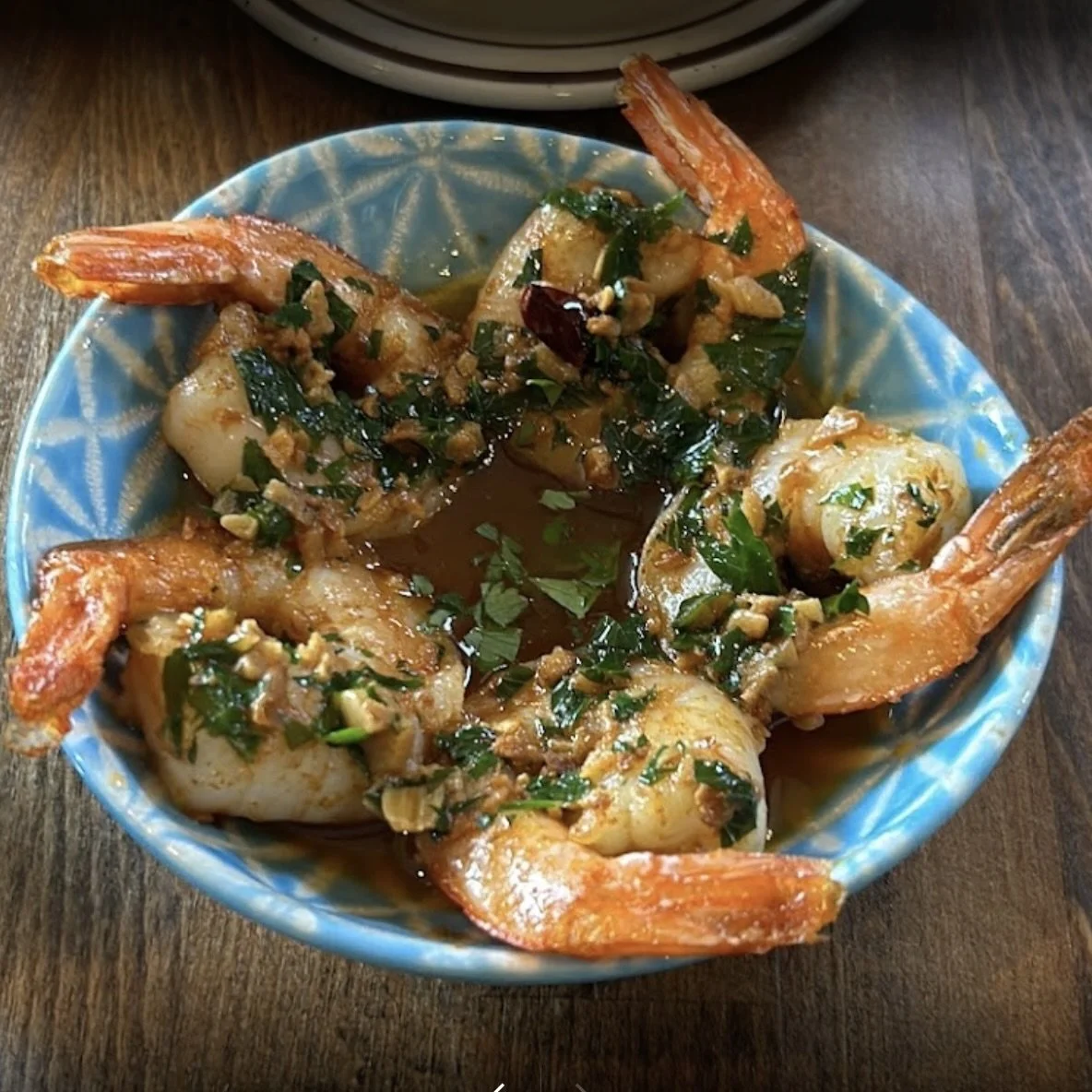GAMBAS AL AJILLO
Shrimp, garlic, olive oil, guindilla pepper, baguette (shellfish) · Spain