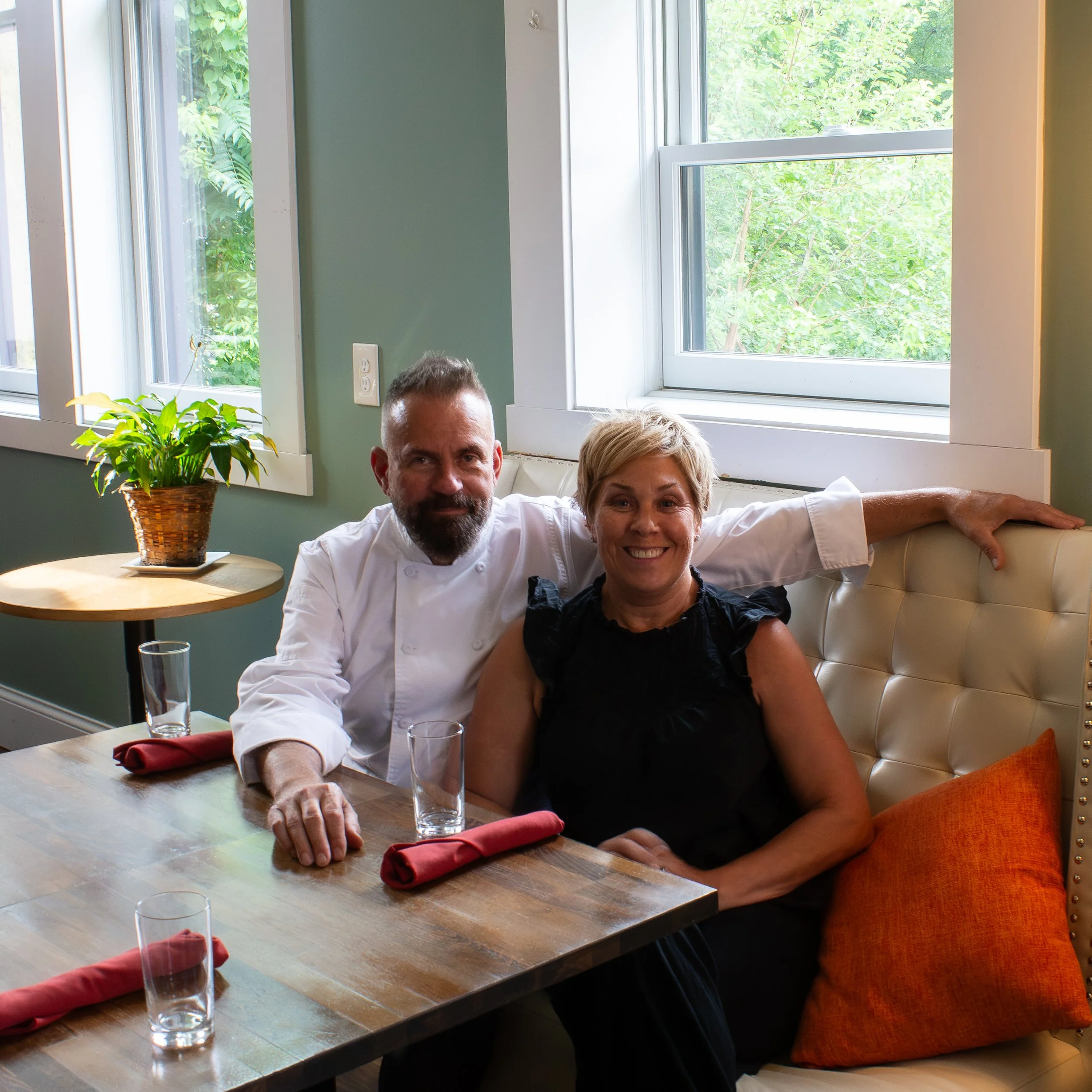 Challis and Lauren Hodge seated at the restaurant.