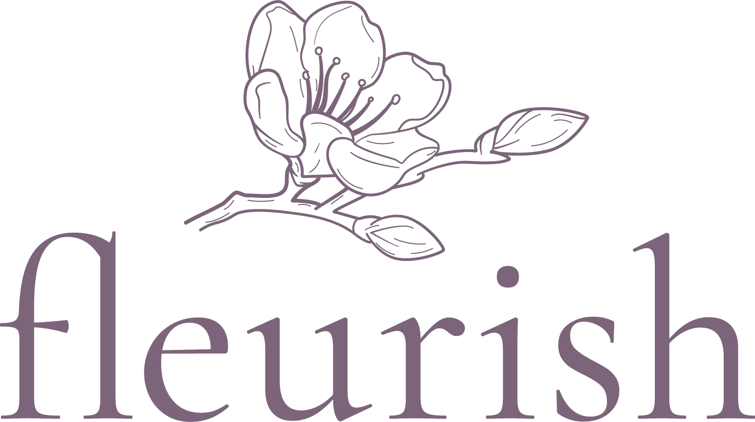 A line drawing of a magnolia flower with leaves above the word "fleurish" in purple lettering.