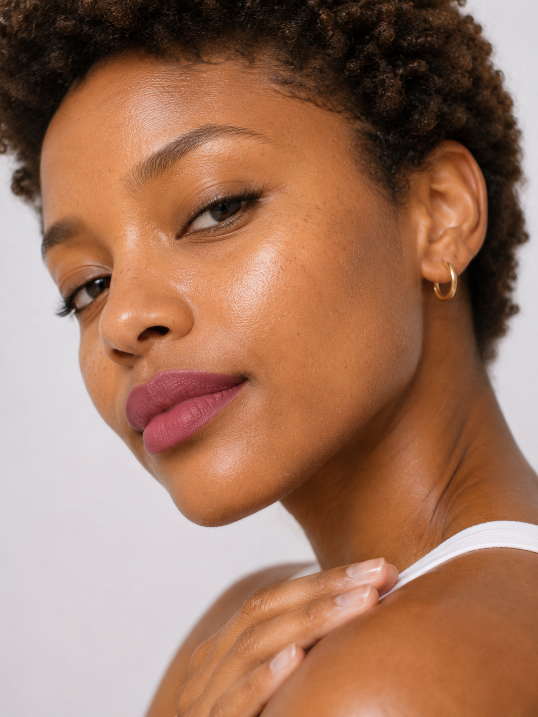 african american female model dusty rose lipstick.png