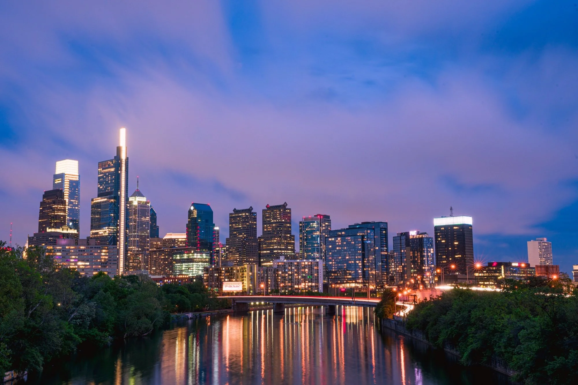 Philadelphia skyline at dusk, where Dr. Monica Campbell & Associates is based.