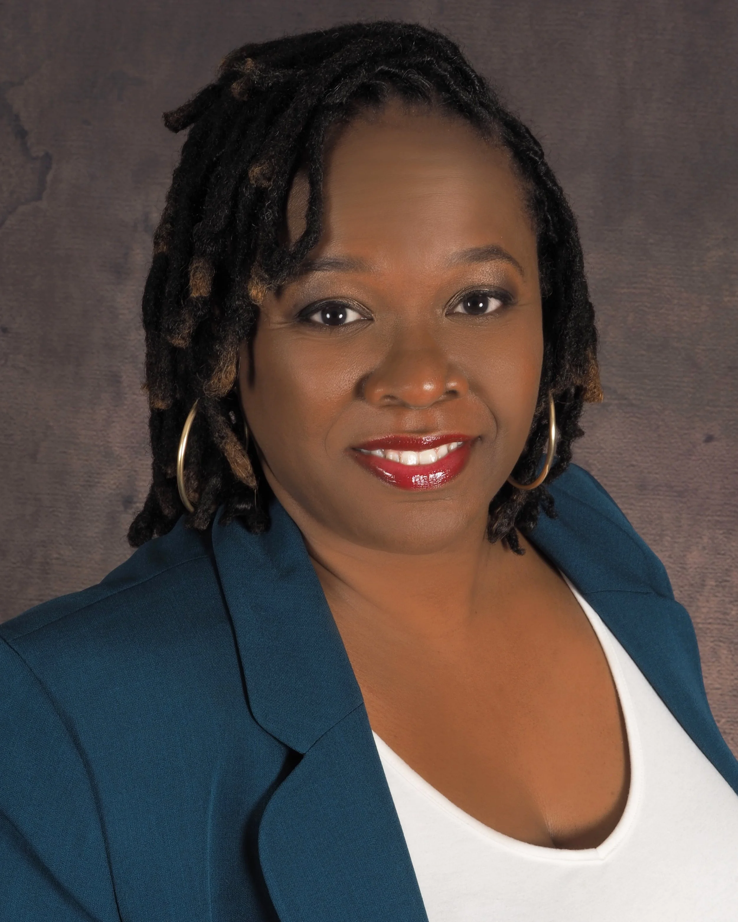 Dr. Jade Logan, board-certified clinical psychologist specializing in trauma and women's issues