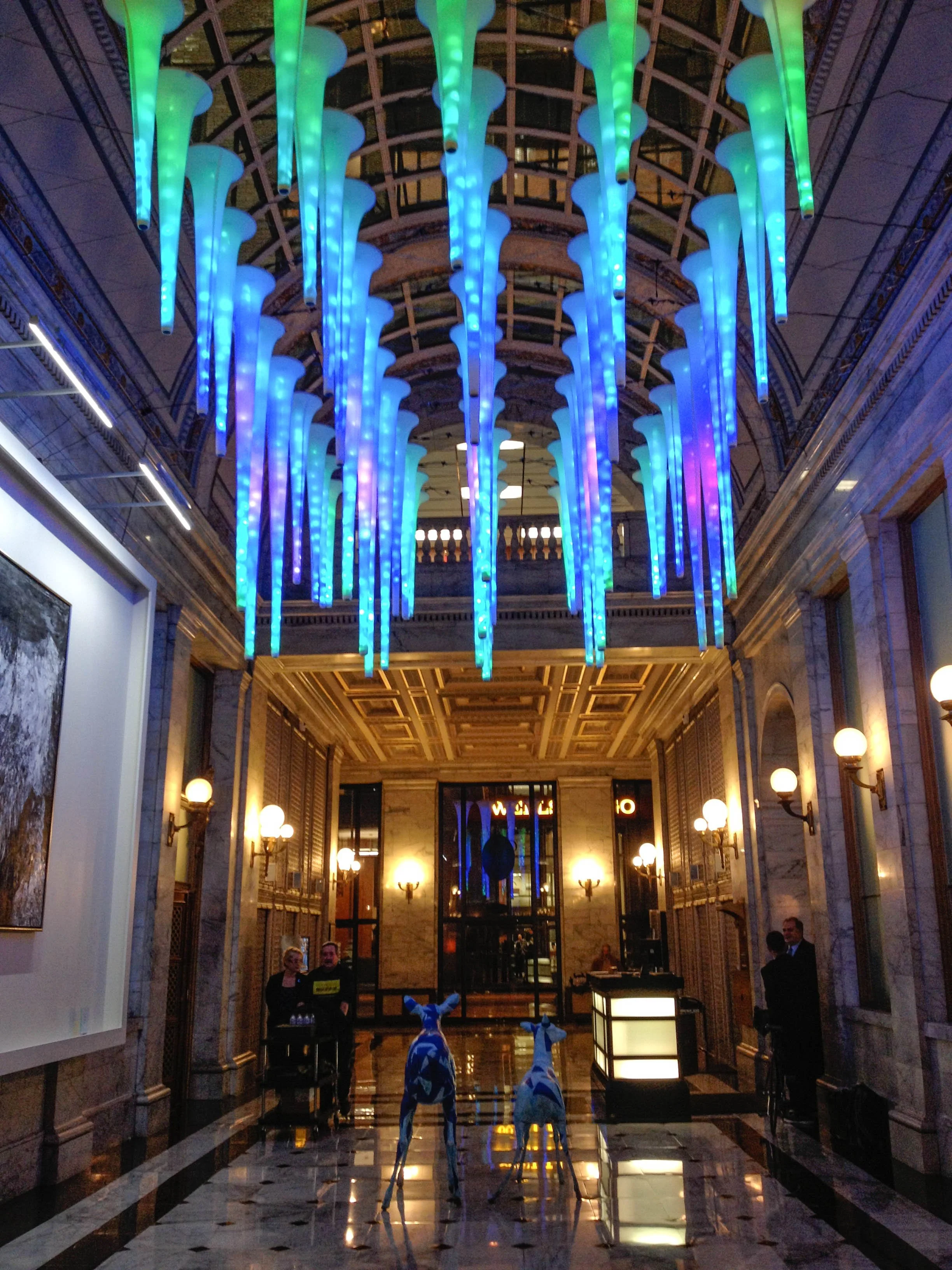 A series of icicyle-like formations illuminate the foyer of a historic San Francisco building.