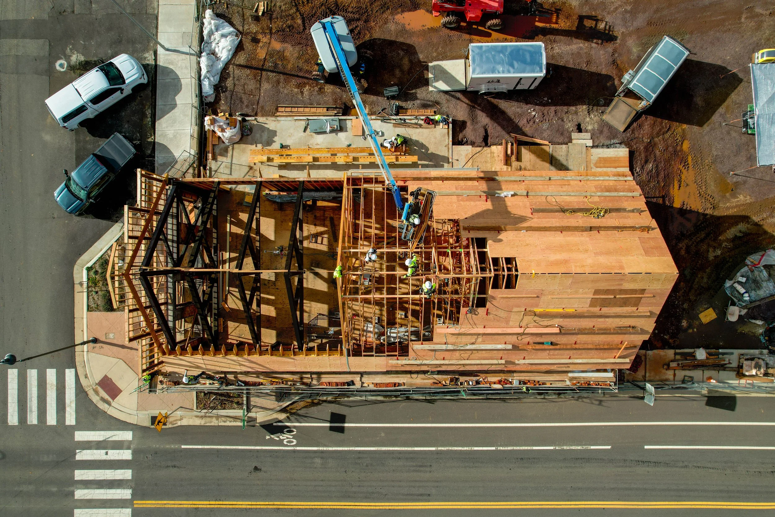 Our team puts the roof on the Way Station.