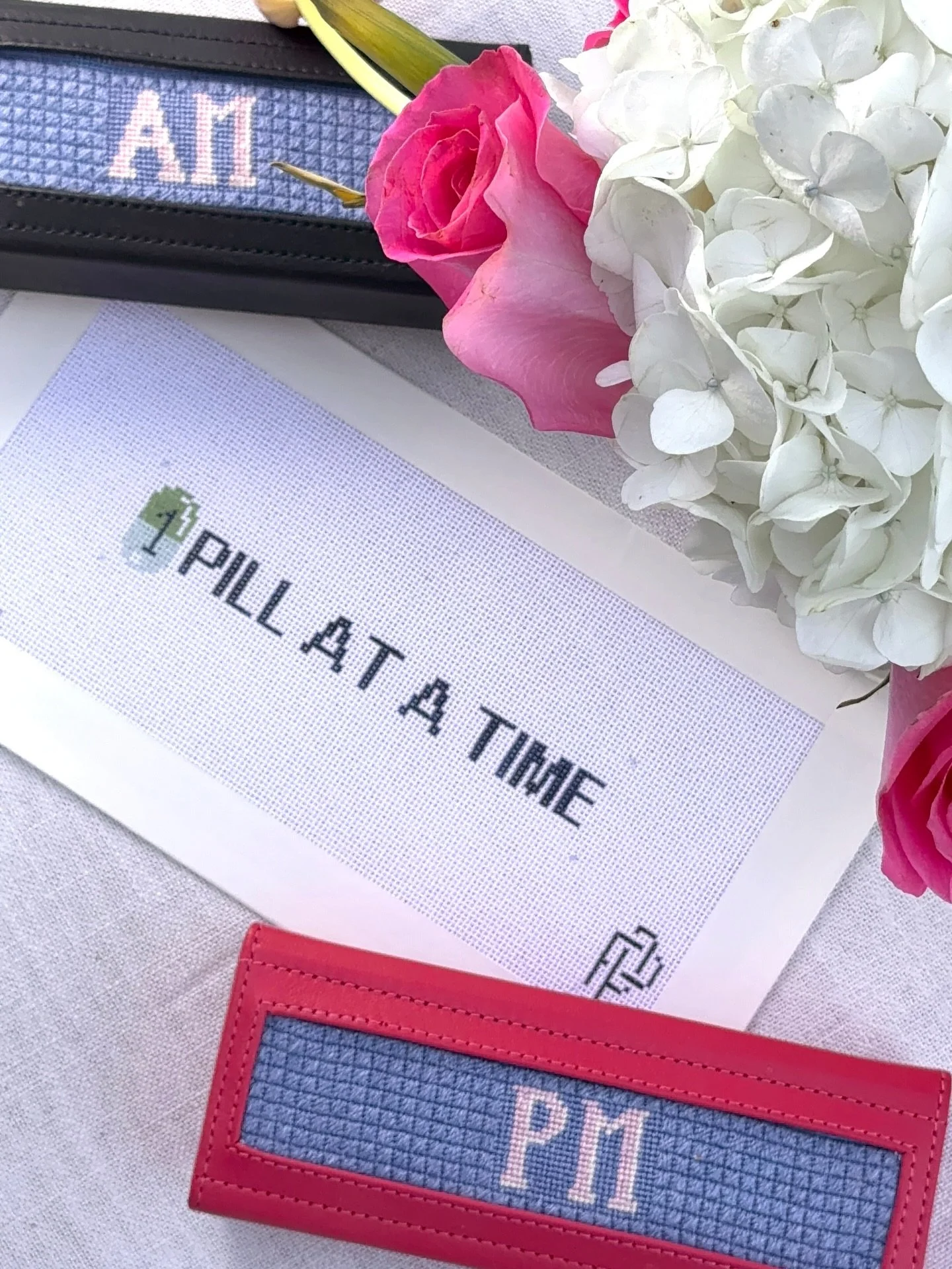 One pill at a time.

These AM/PM needlepoint pill cases started as something I wanted for myself. A way to make the daily act of taking medication feel a little less medical and a little more like self-care (and prettier). The canvases are sized to s