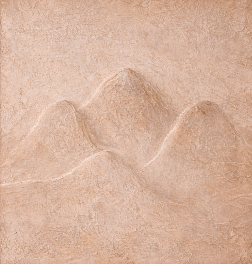 Close-up of a beige, textured surface with a pattern resembling mountain peaks.