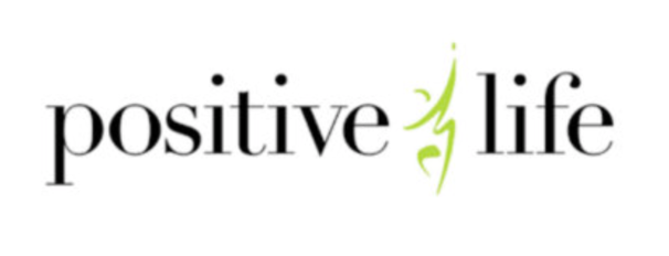 The words 'positive life' with a stylized green smiley face between them.