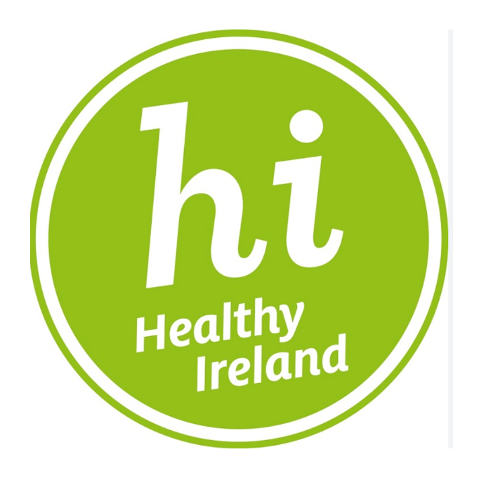 Green circular logo with white text that reads 'hi Healthy Ireland'.