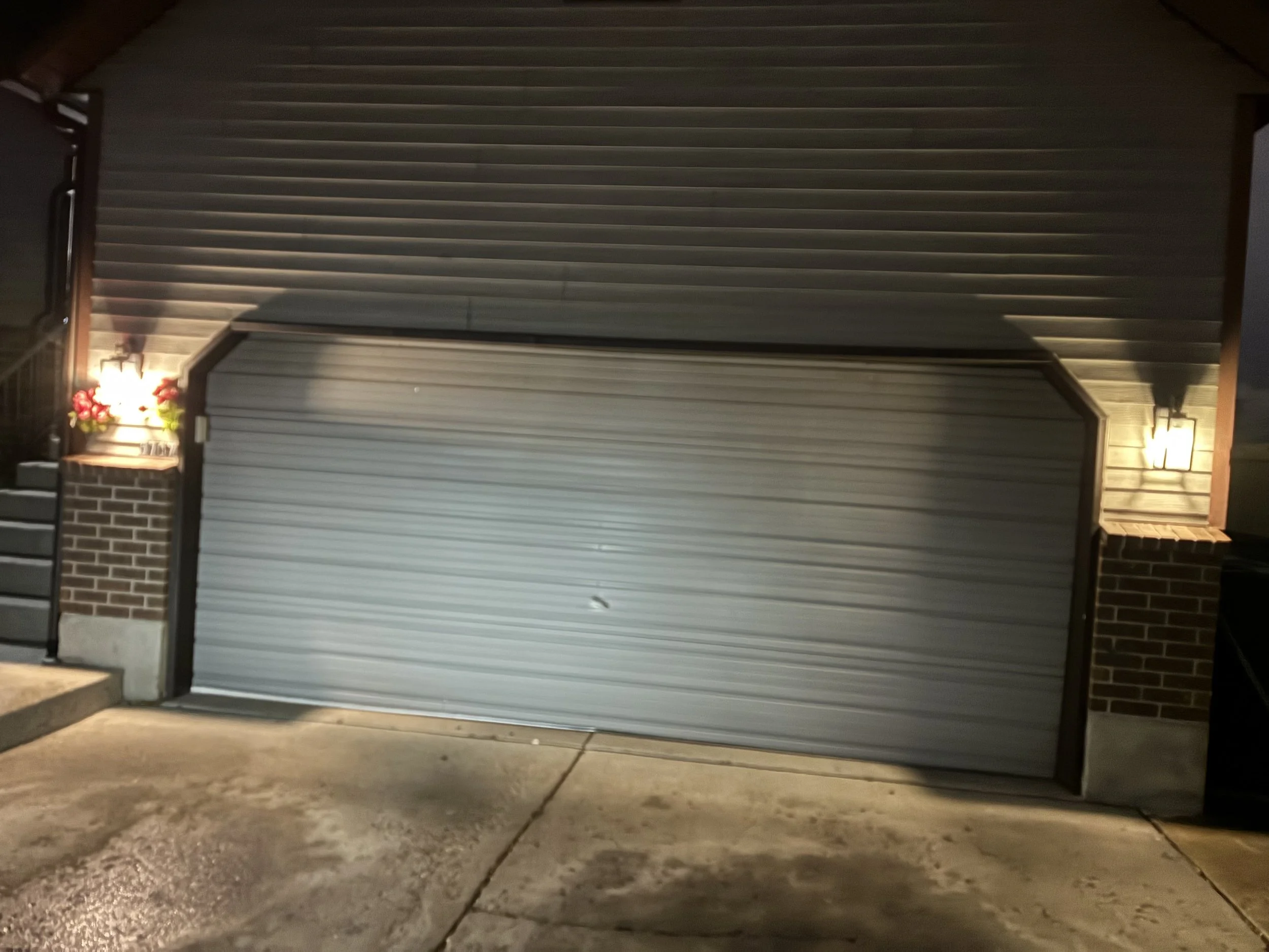 Garage door closed and operating after off-track repair