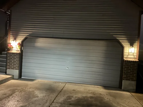 Garage door closed after off-track repair