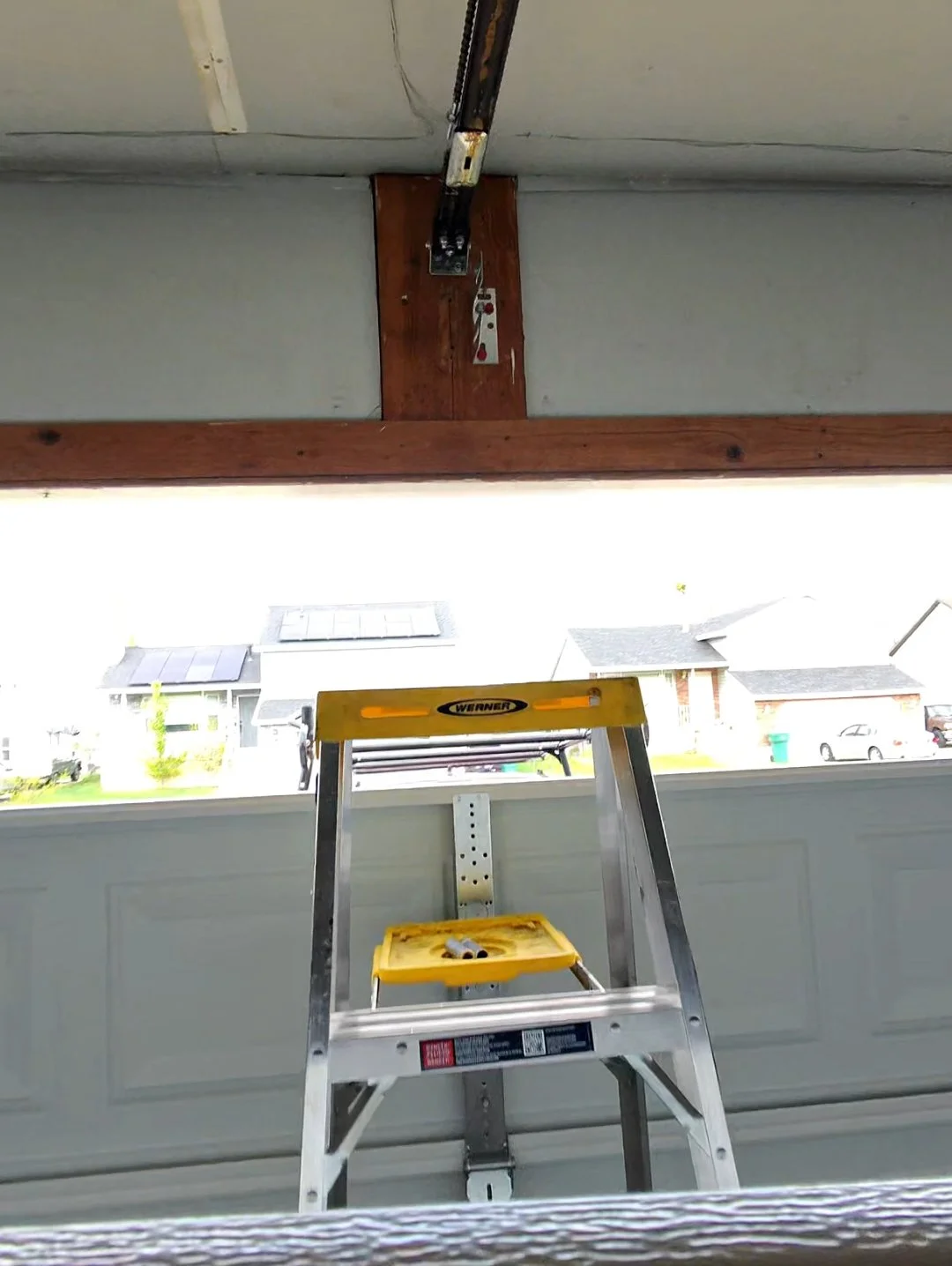 Garage door opening and hardware setup before installation work
