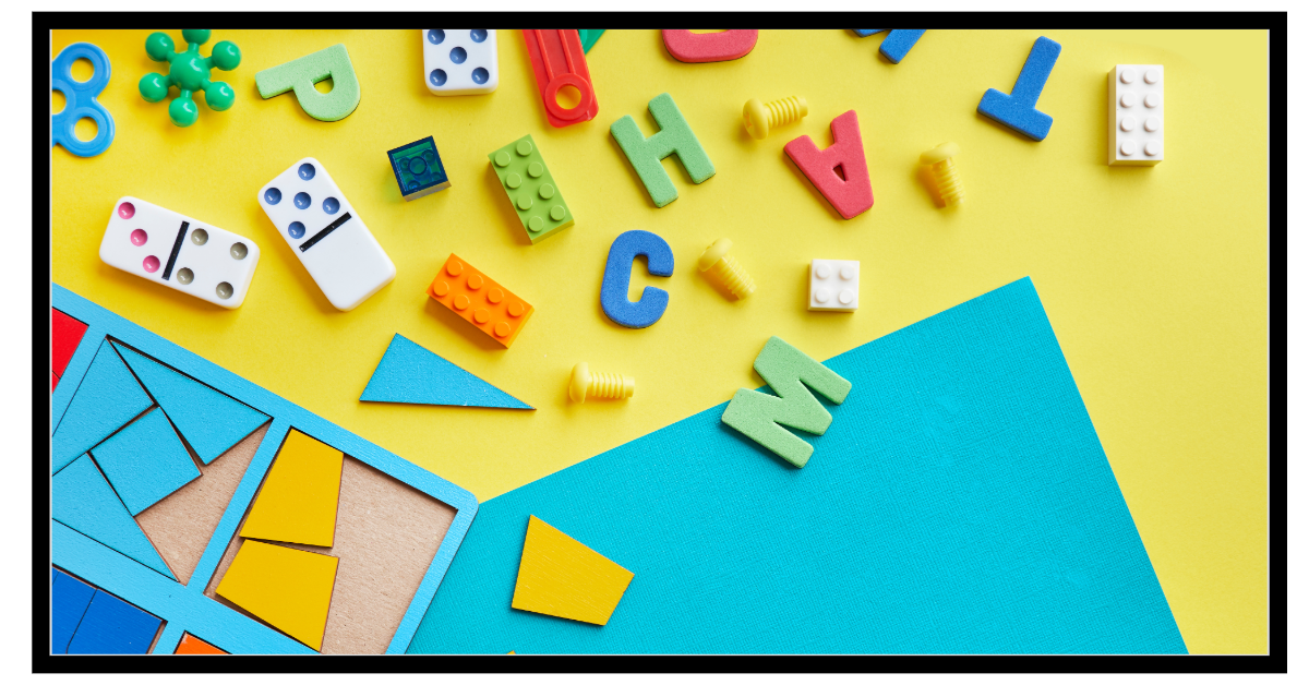 Image of scattered letters, LEGO, dominos, and misc shapes