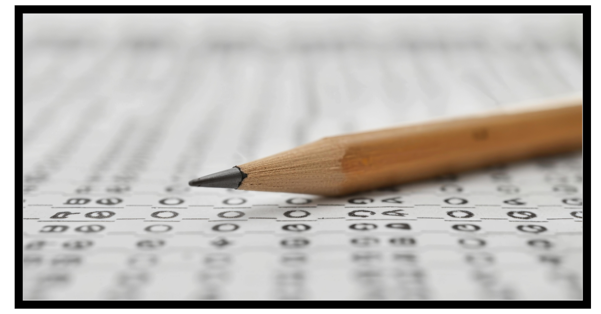 Sharpened pencil laying on a generic bubblesheet