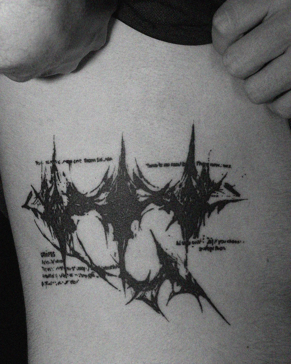 Sharp symbolic lines and typography tattoo on stomach. Dark aesthetic blackwork by ghost.of.catharsis.