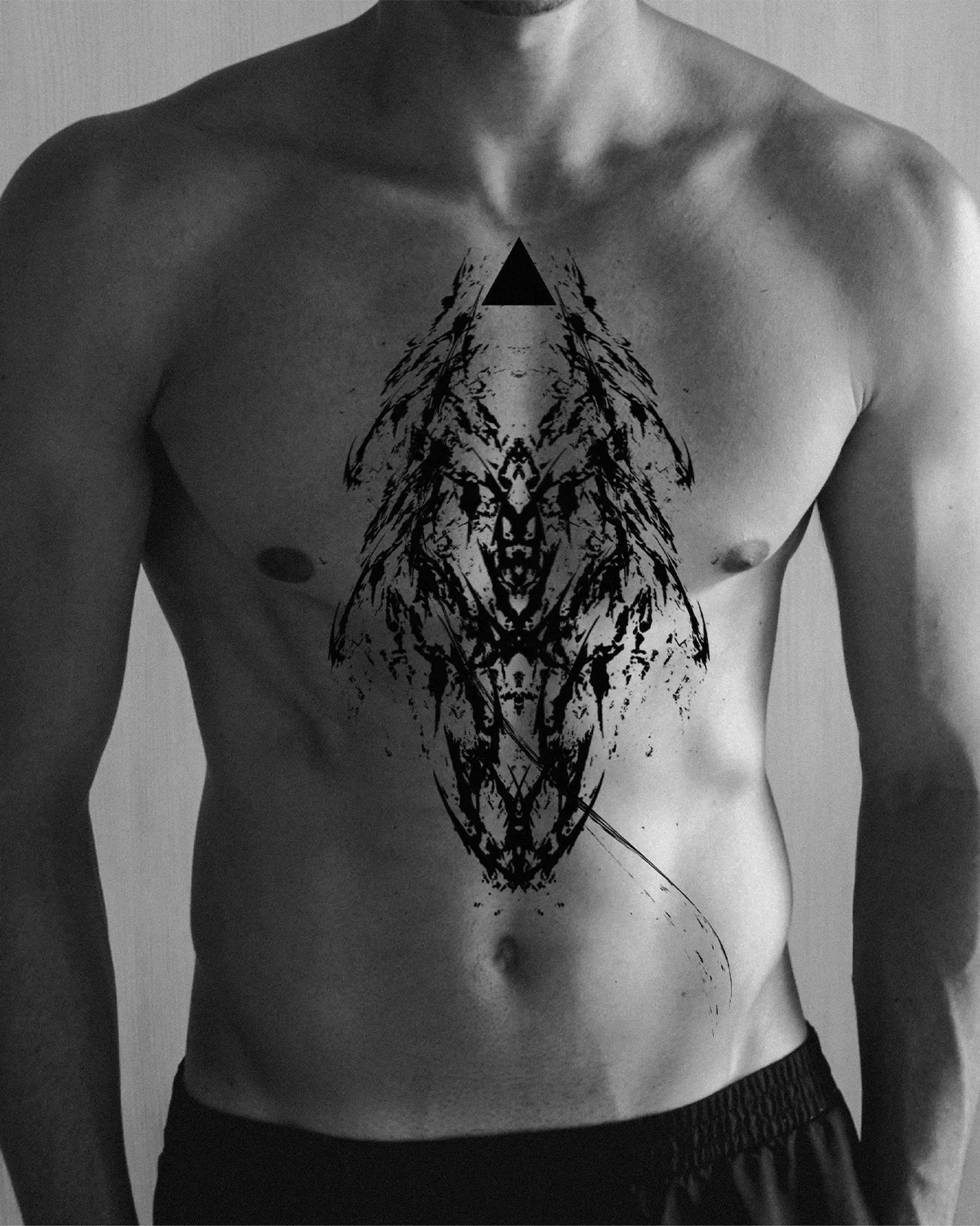 ghost.of.catharsis — Ordo ab Chao project. Symmetrical Rorschach-style blackwork on the chest and torso. Hermetic philosophy expressed through dark ornamental ink.