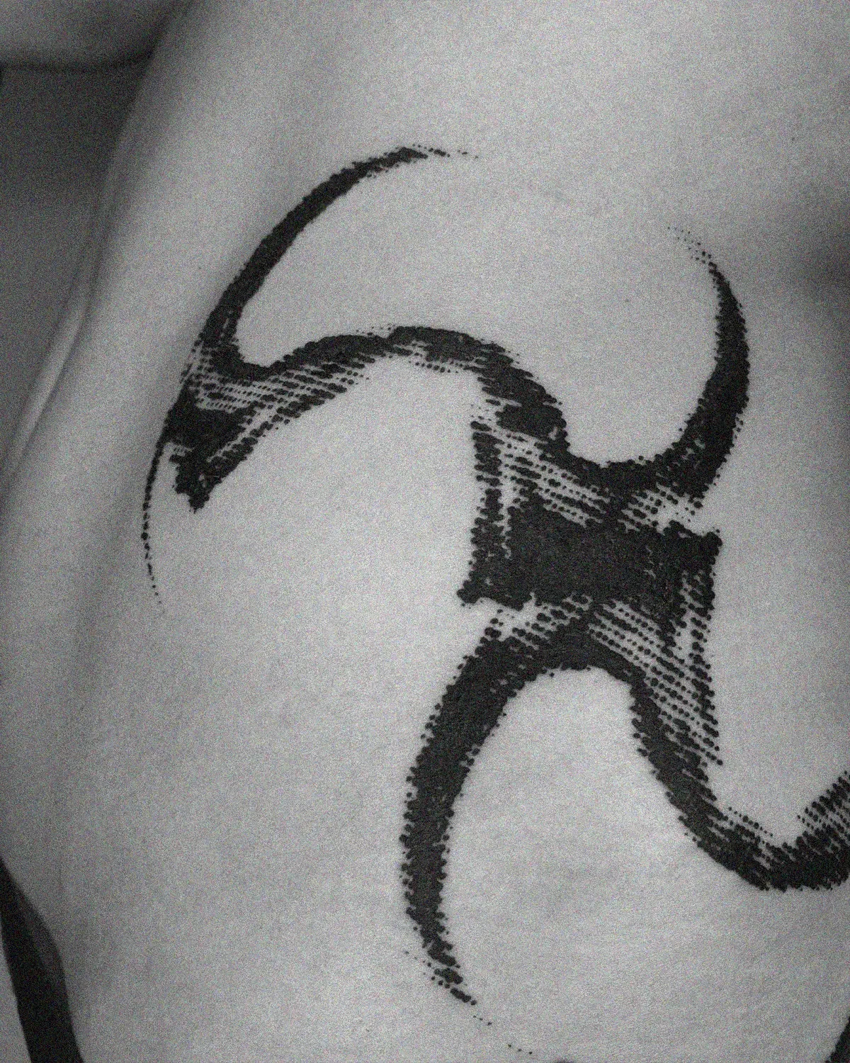 Abstract symbolic blackwork on side. Minimalist dark ink art study by ghost.of.catharsis.