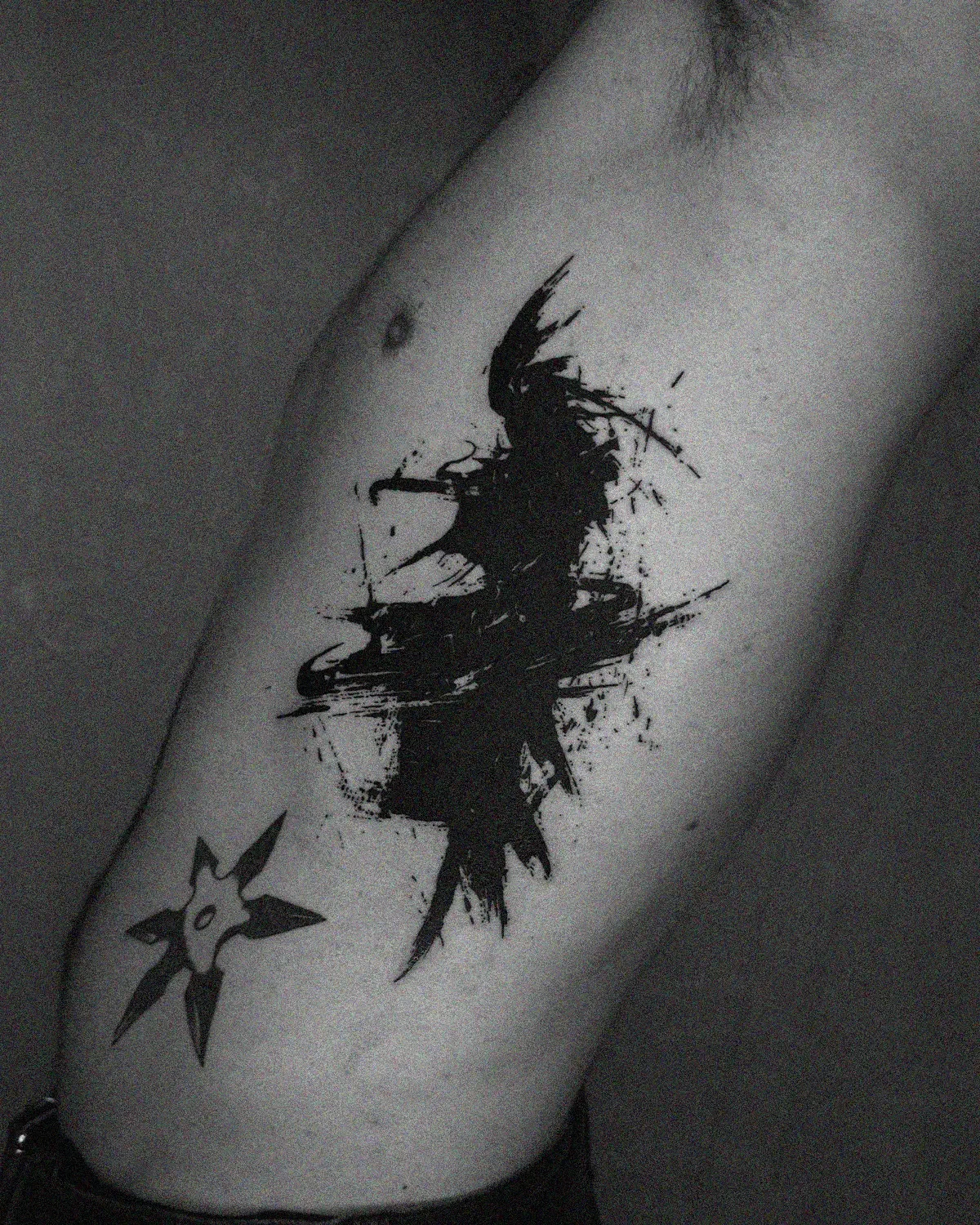 Graphic abstract tattoo on ribs. High contrast blackwork ink by ghost.of.catharsis.