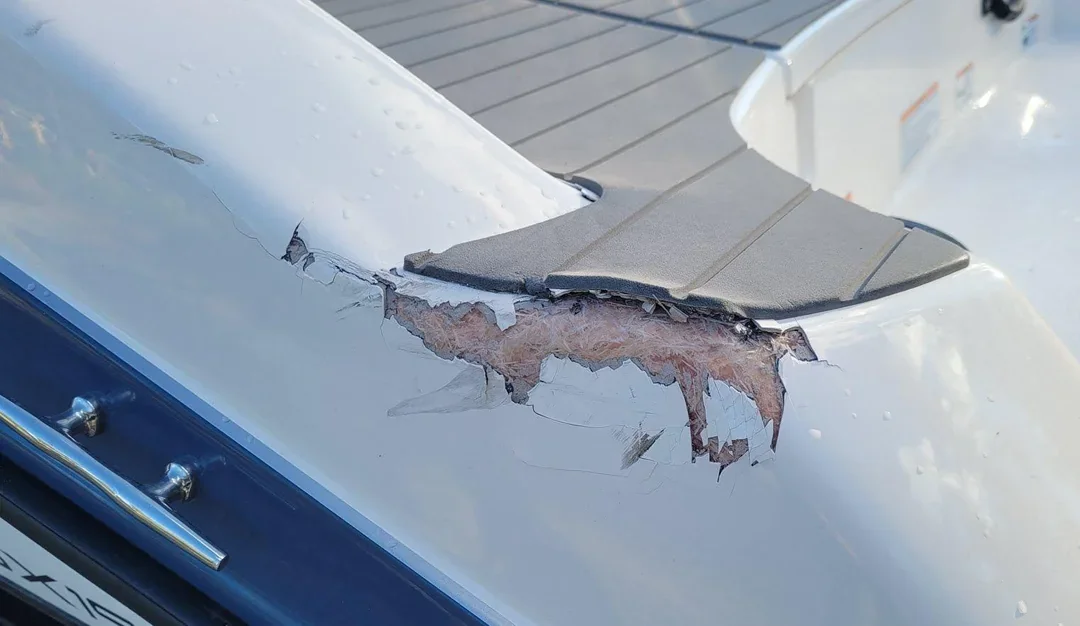 fiberglass damage on a boat from hitting a dock