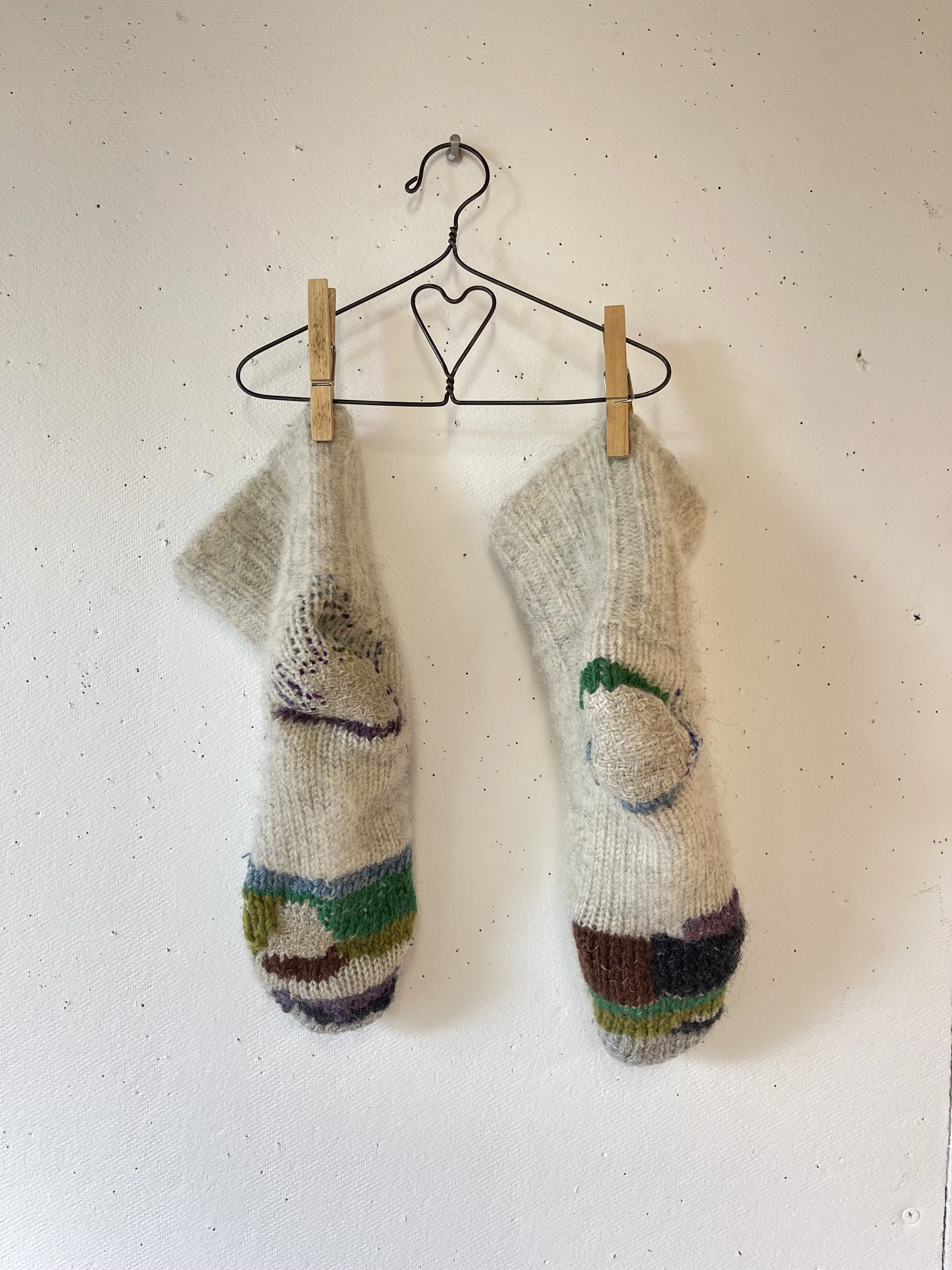 thick hand-knit socks, saved with colorful swiss + straight darning 