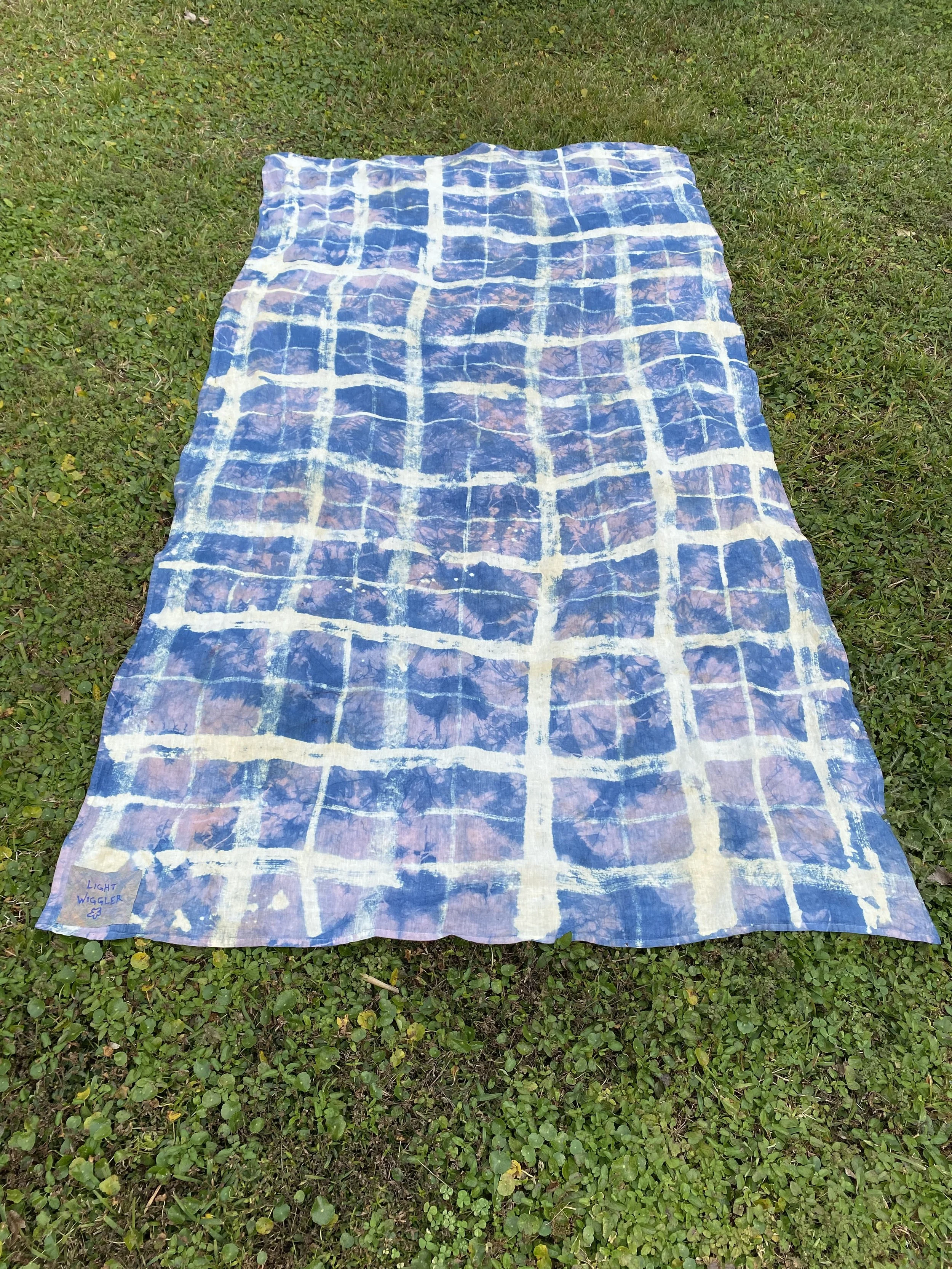 linen table cloth dyed with logwood, indigo, + hand-painted bleach, 2022