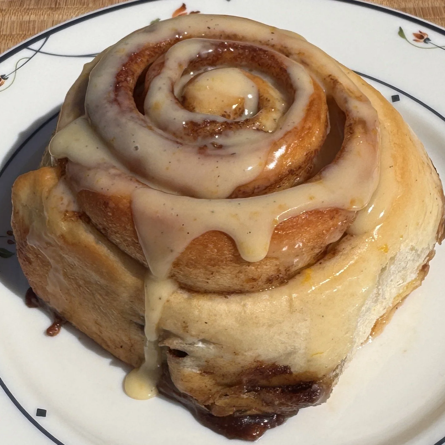 Cinnamon roll with maple glaze icing, filled with delectable and buttery cinnamon sugar filling.