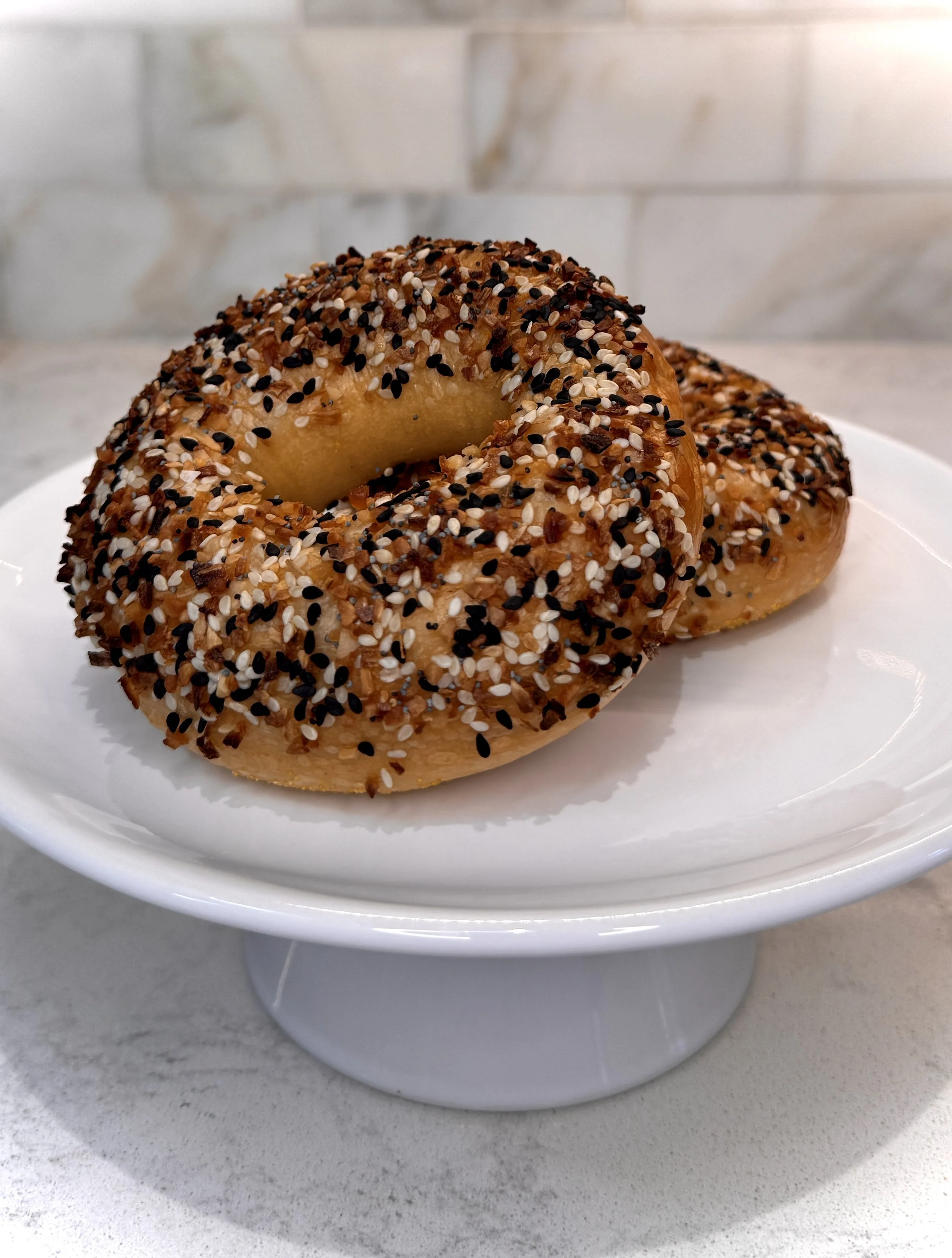 Everything bagel on stand.jpg