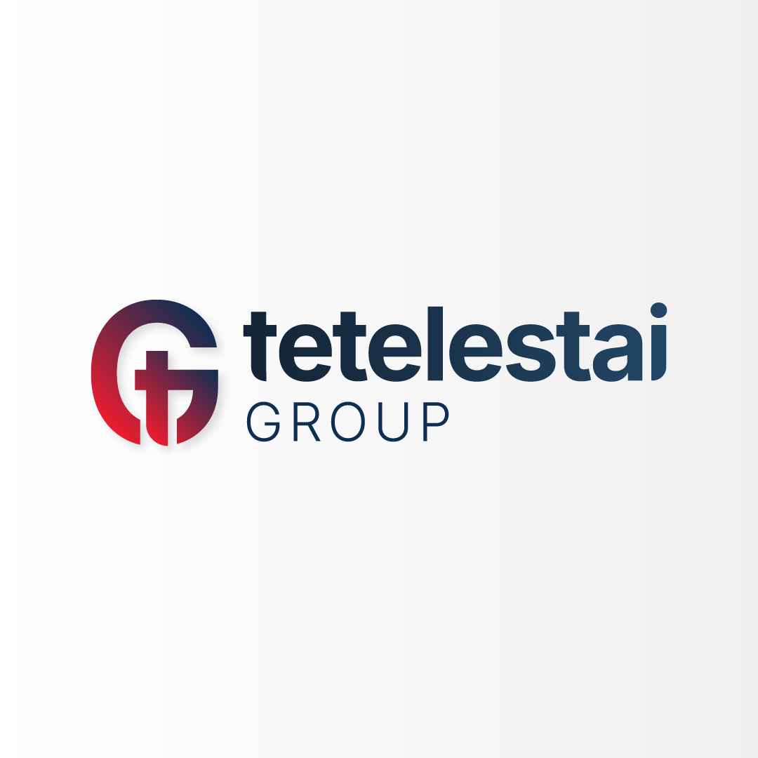 Logo of Telestai Group with a stylized cross and letter T in a circular design with red and dark blue colors.
