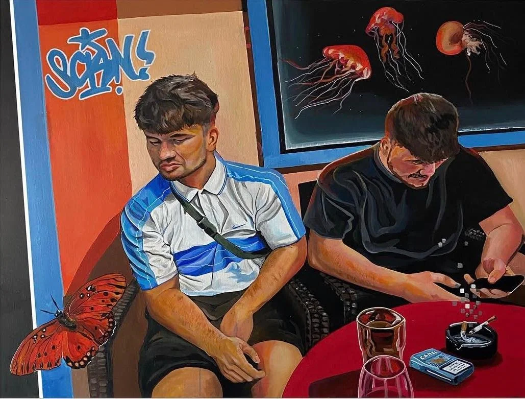 Painting of two young men sitting at a table in a café or lounge. The man on the left, wearing a white and blue sports shirt, appears sleepy or bored. The man on the right, dressed in black, is looking at his phone. On the table are drinks, a pack of cigarettes, and an ashtray with cigarettes. Behind them, a wall features red and blue graffiti-style art and a large painting of jellyfish.