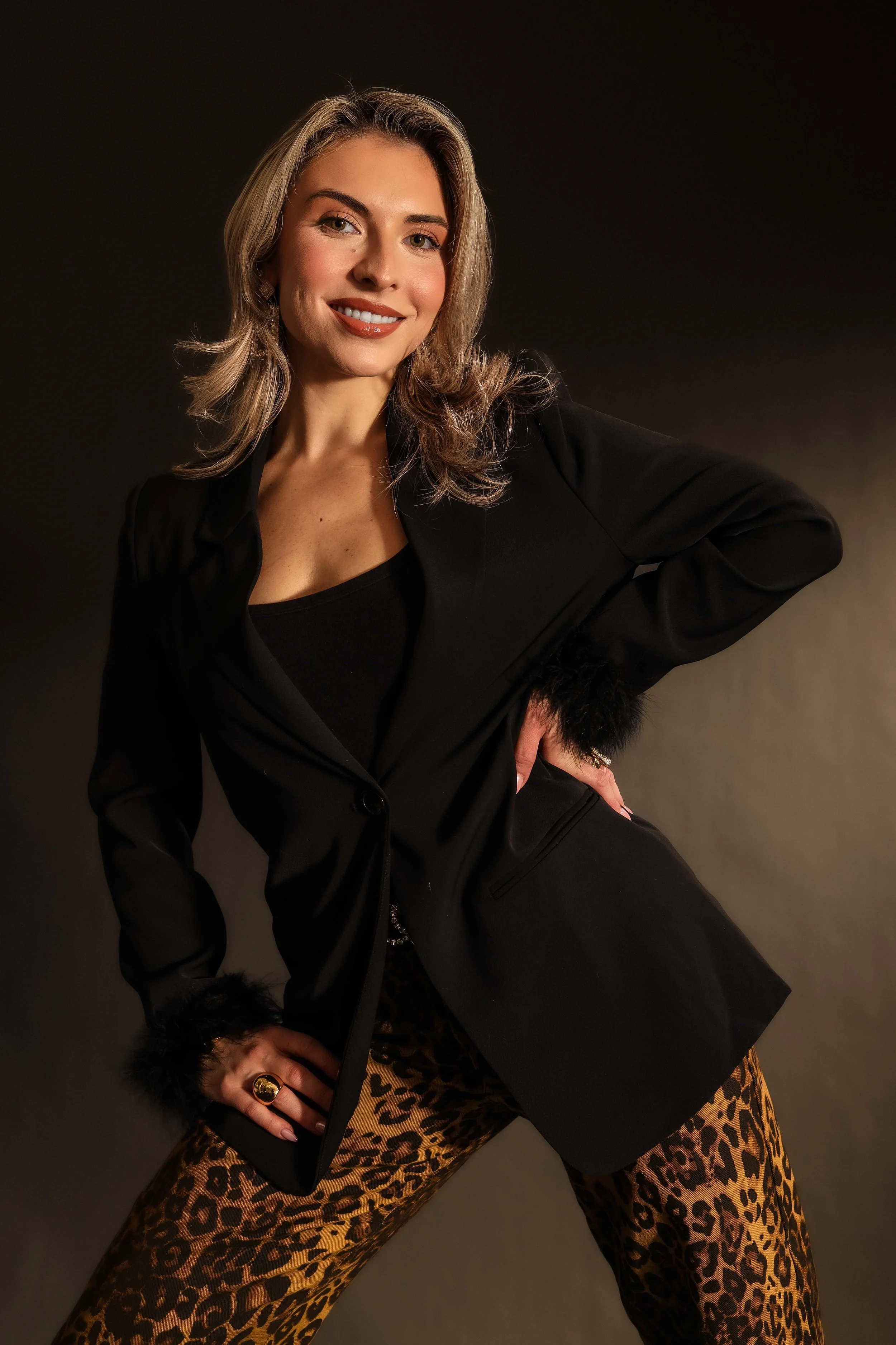 Valerie High Fashion - lunging smile with teeth.jpg