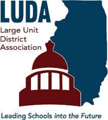Logo of LUDA, Large Unit District Association, featuring a map outline of Illinois and a stylized dome of a government building, with accompanying text.