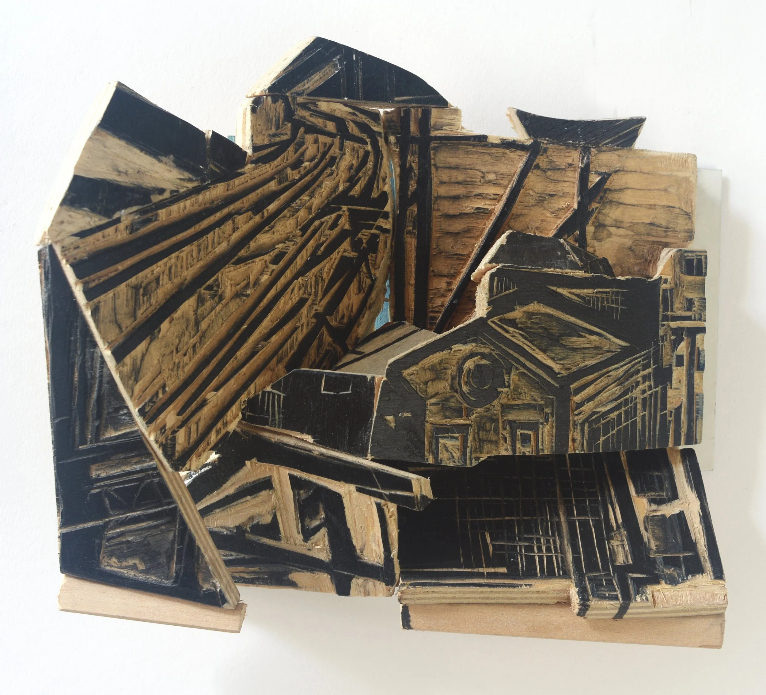 shelter/onderdak woodcut collage 20x18x7cm 2023