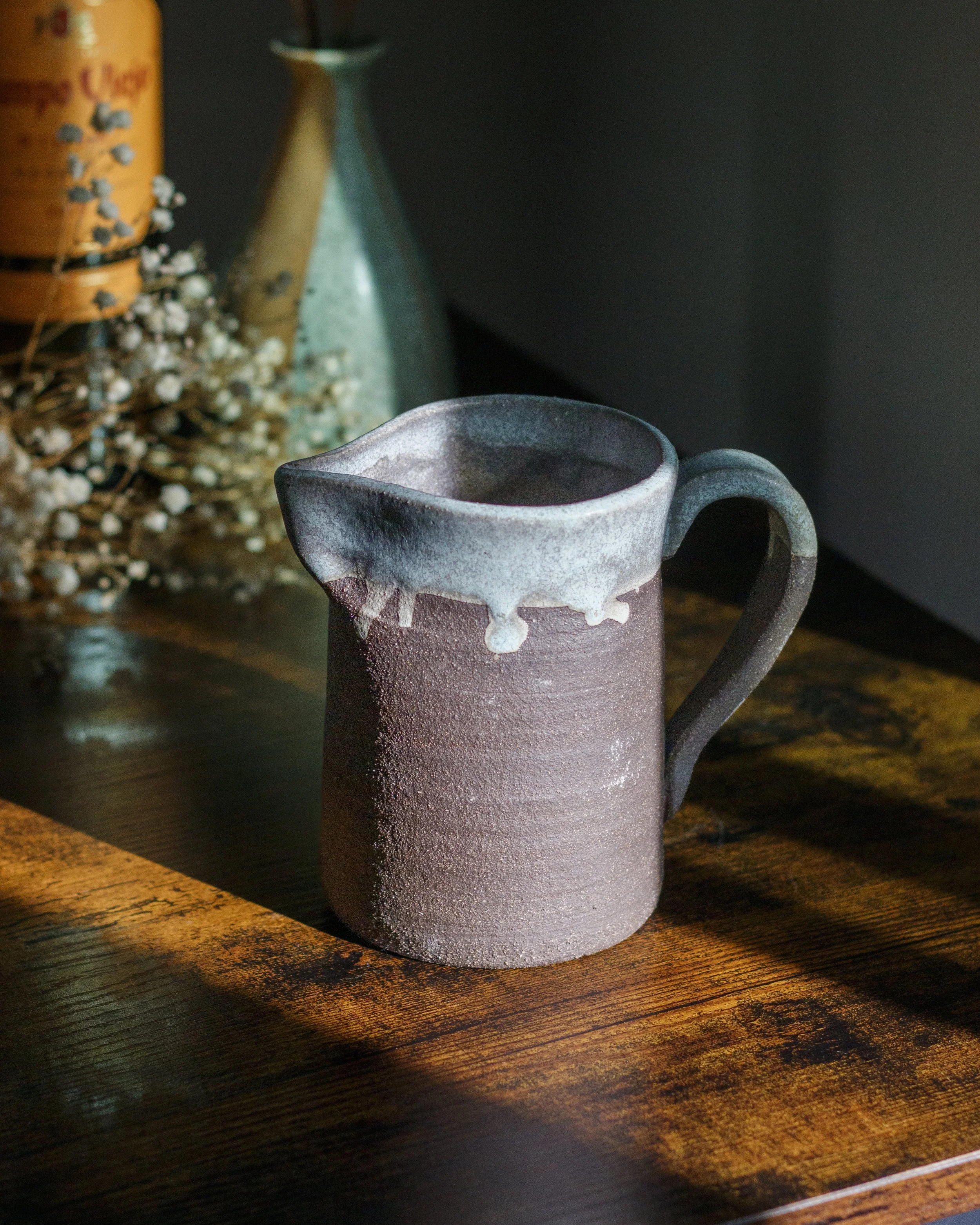 Rustic Black Clay Pitcher