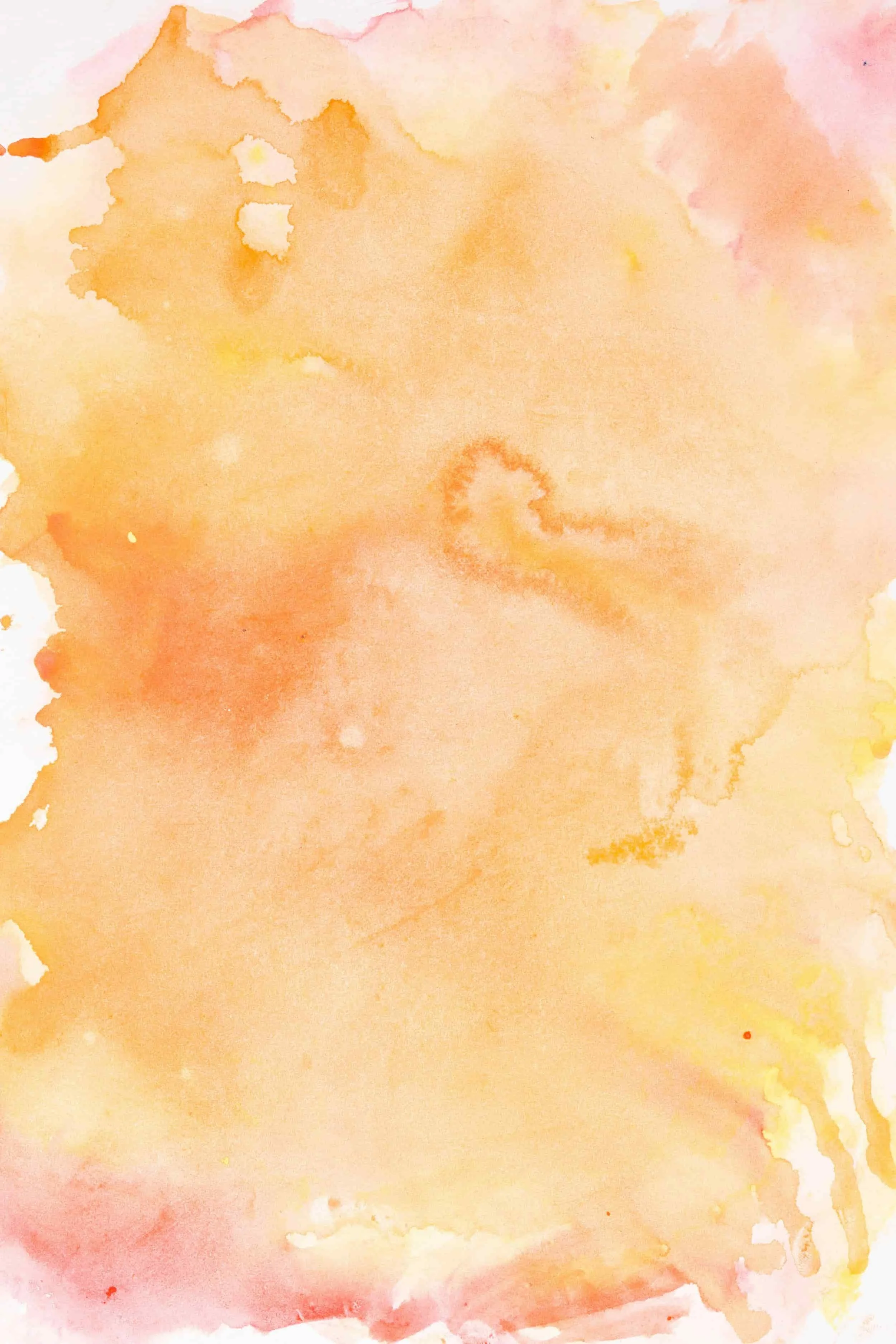 Watercolor painting with soft pastel shades of peach, pink, yellow, and orange blending together.