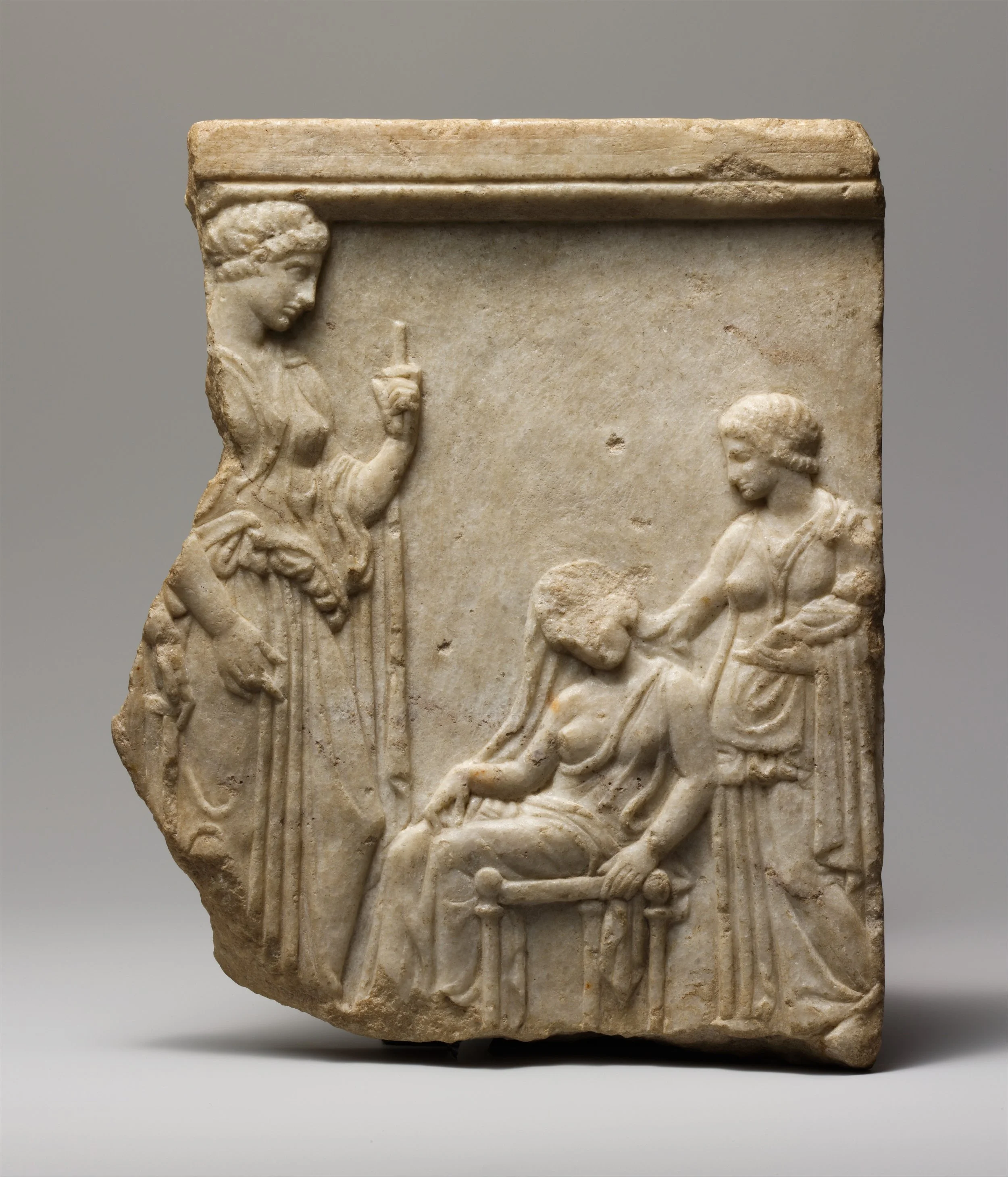Marble votive relief fragment of goddesses, mother, nurse, and infant.jpg