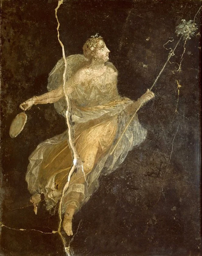 Ancient fresco of a female figure holding a mirror in her left hand and a scepter with a leafy top in her right hand, set against a dark background, with visible cracks.