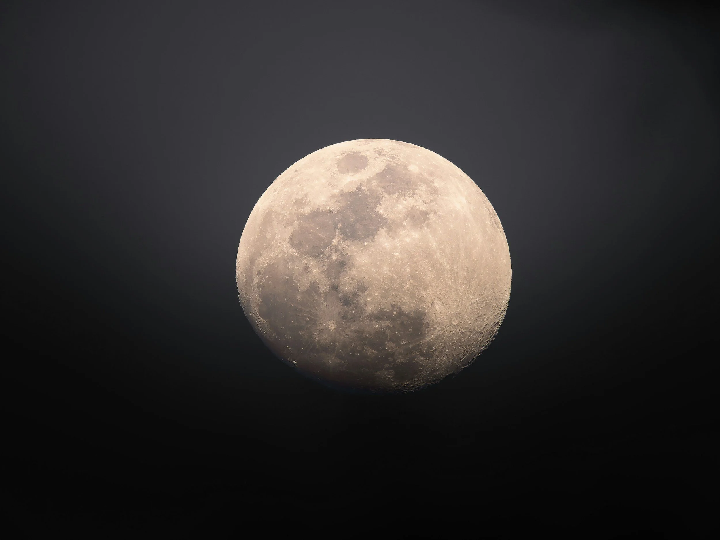 A full moon against a dark night sky with no clouds symbolizing clarity, focus, and personal power