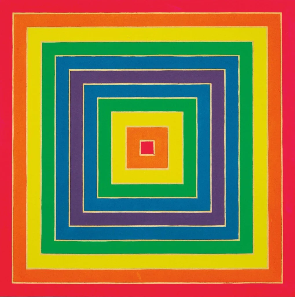 Colorful geometric design with concentric squares in red, orange, yellow, green, blue, and purple, creating a vibrant, symmetrical pattern.