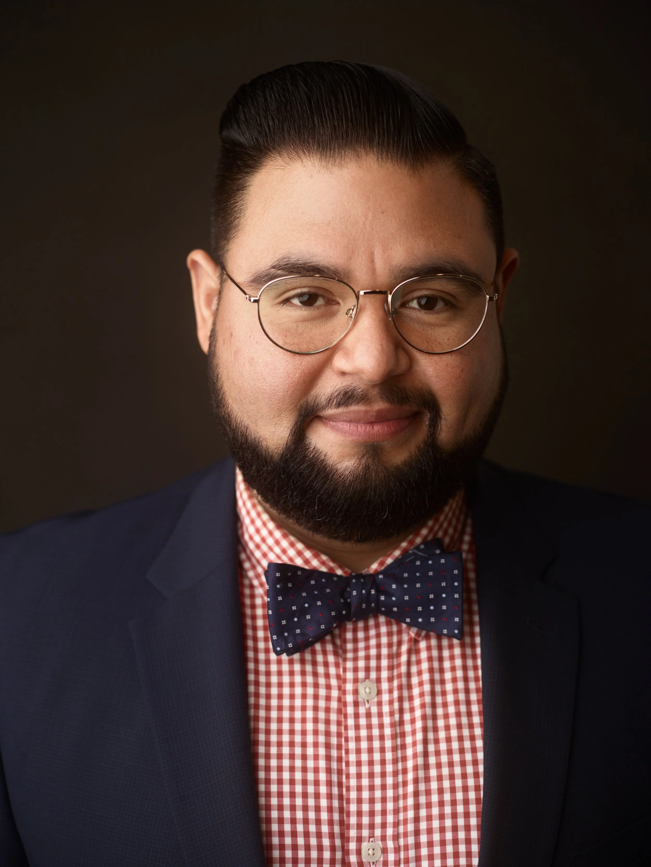 A portrait of Brian Amaya, Esq., a bilingual expert in criminal defense near me in Oakland, Berkeley, Albany, and the Bay Area, California.