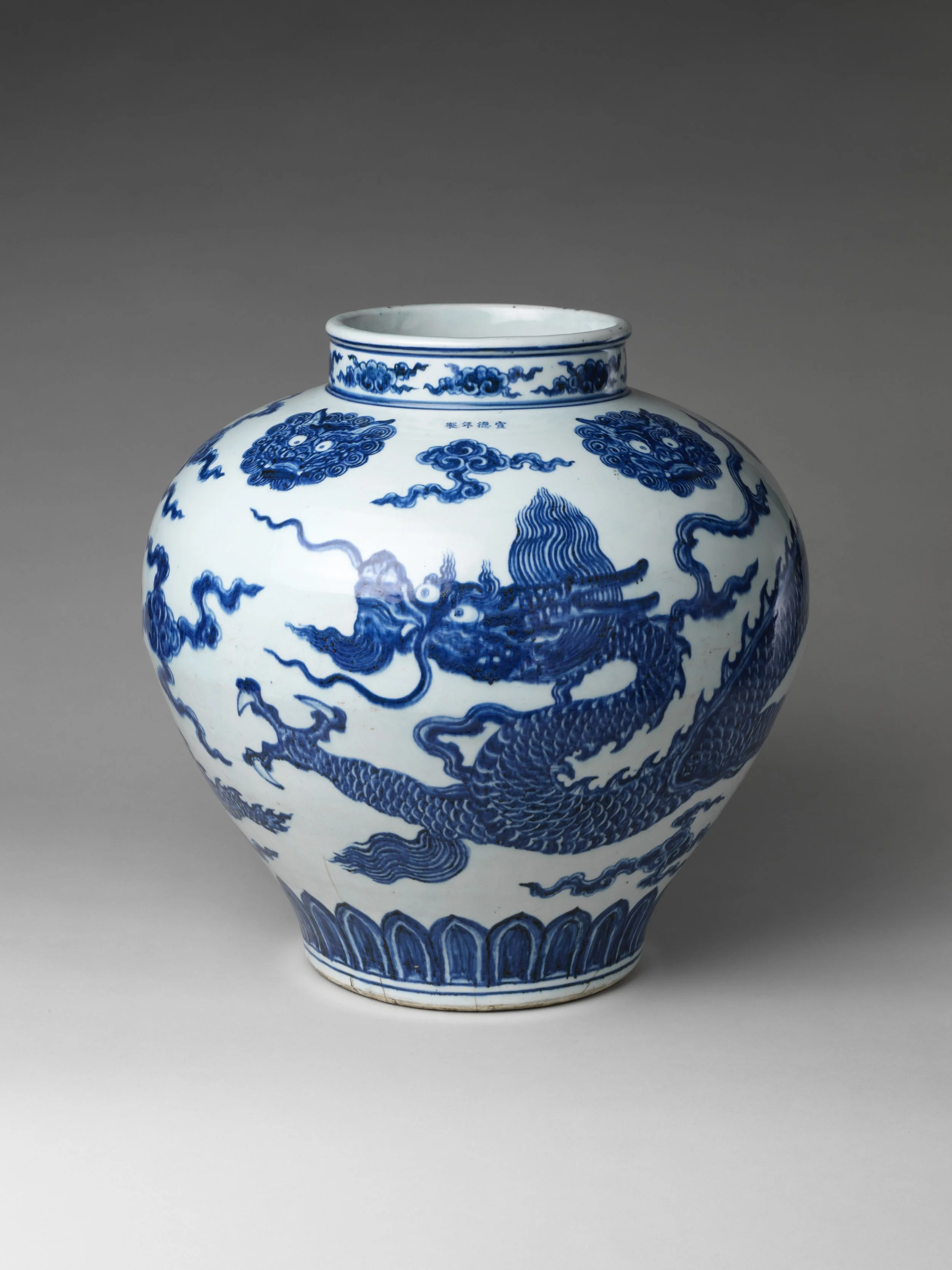 Blue and white porcelain vase featuring a dragon design.