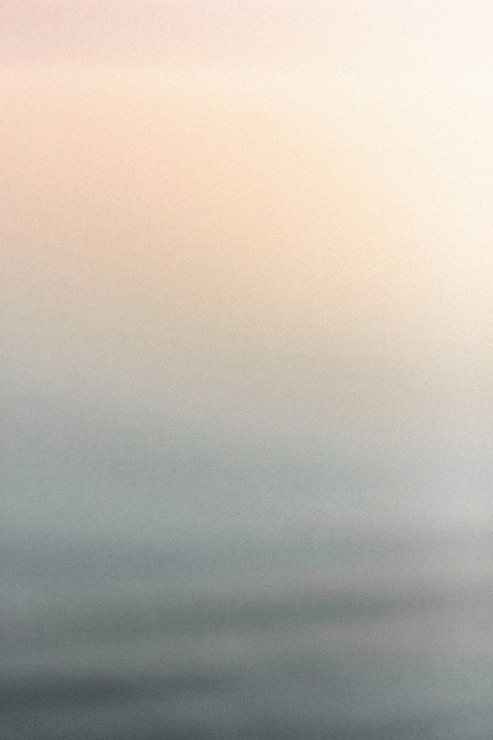 A neutral, slightly grainy background picture that fades from orange to almost blue, similar to a sunset.