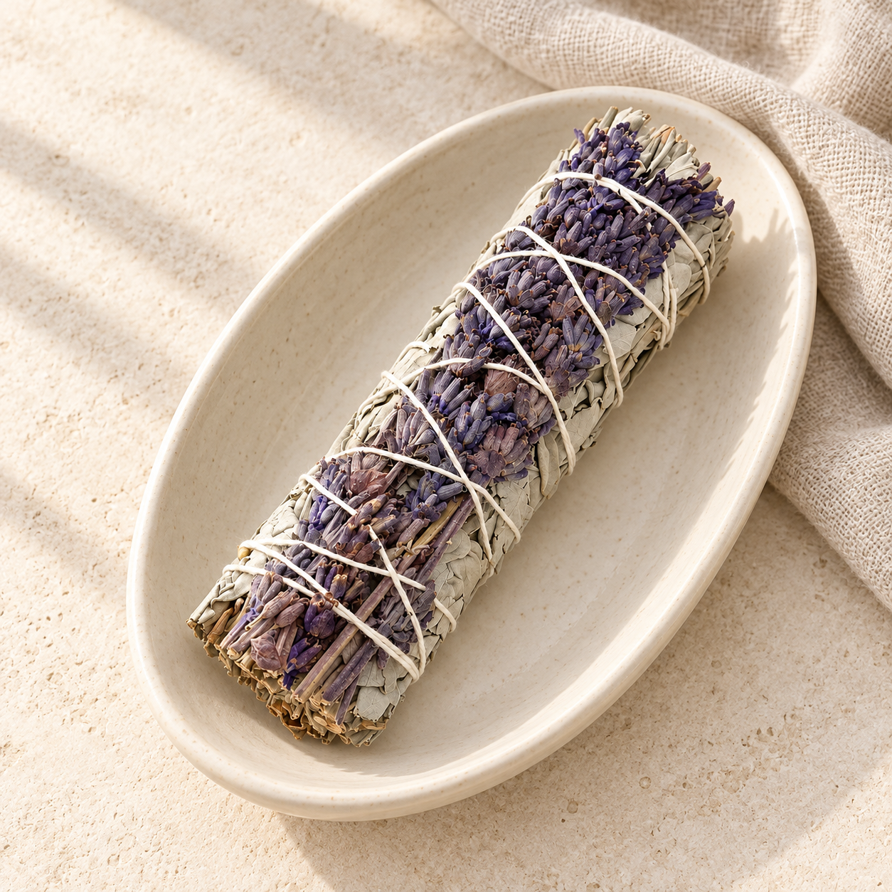 White sage and lavender in ivory dish.png
