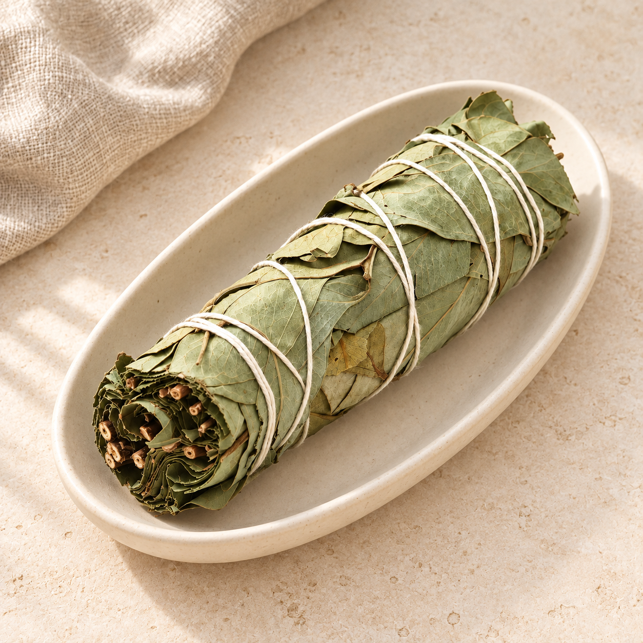 Eucalyptus bundle in an ivory dish.png