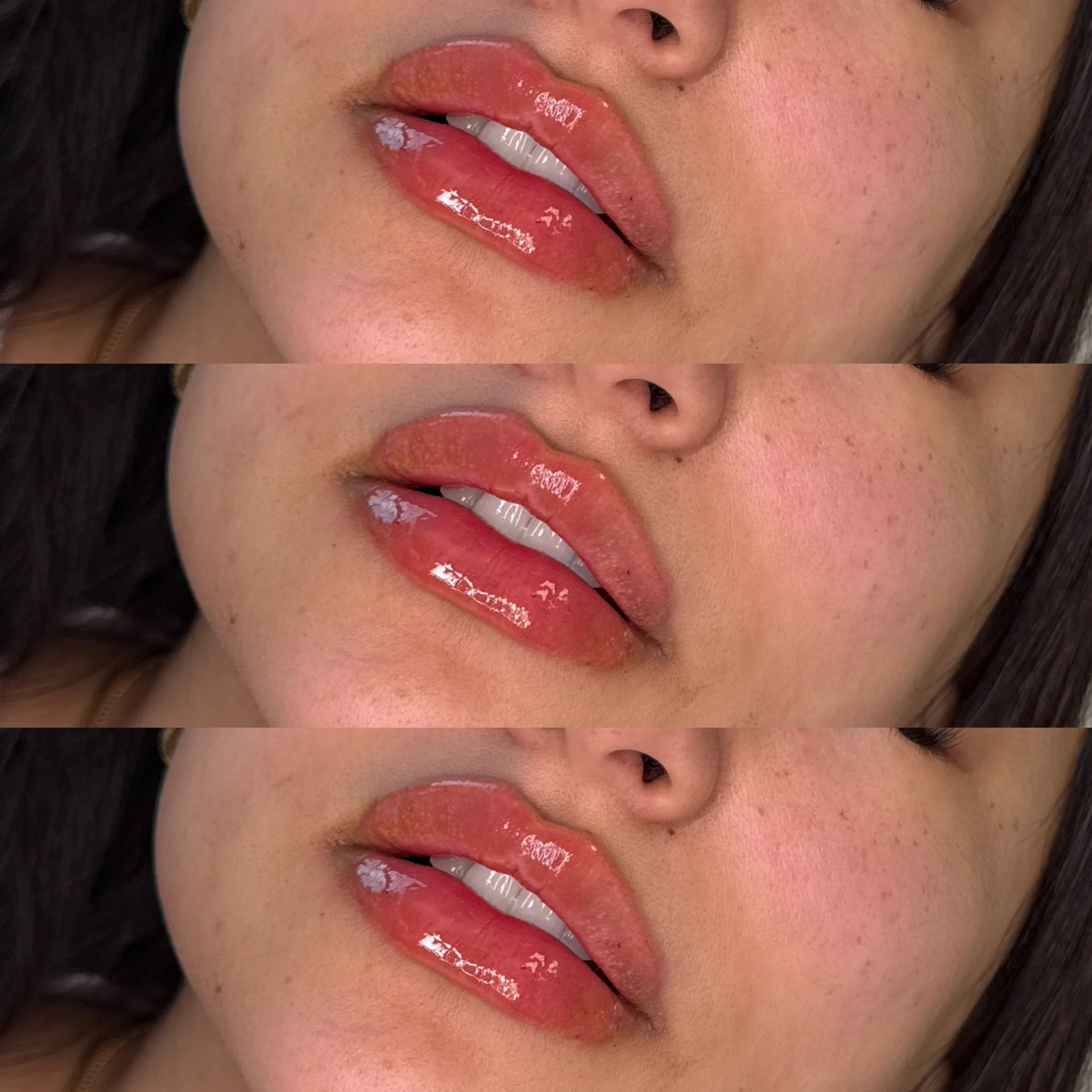 Close-up of lips with glossy pink lipstick, slightly parted, revealing teeth, and a bit of skin and nose visible.